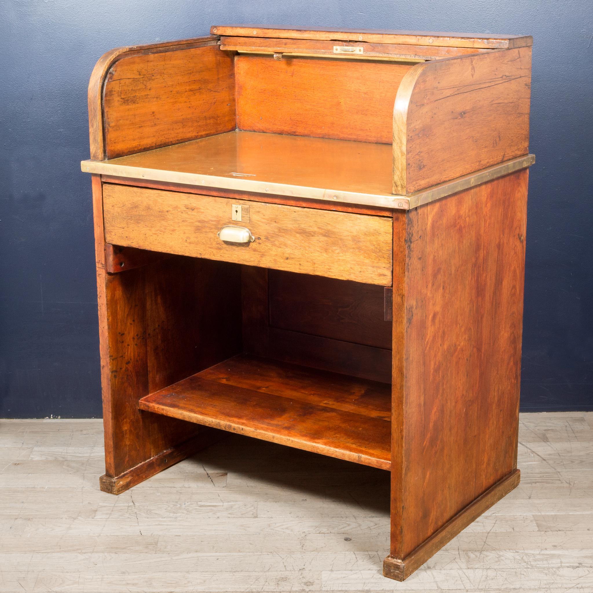 About

An antique oak rolltop desk with brass worktop, brass handles, trimmed in brass, segmented drawer and lower shelf. Very solidly built.

Contact us for more shipping options: S16 Home San Francisco

Creator: Unknown.
Date of manufacture: circa