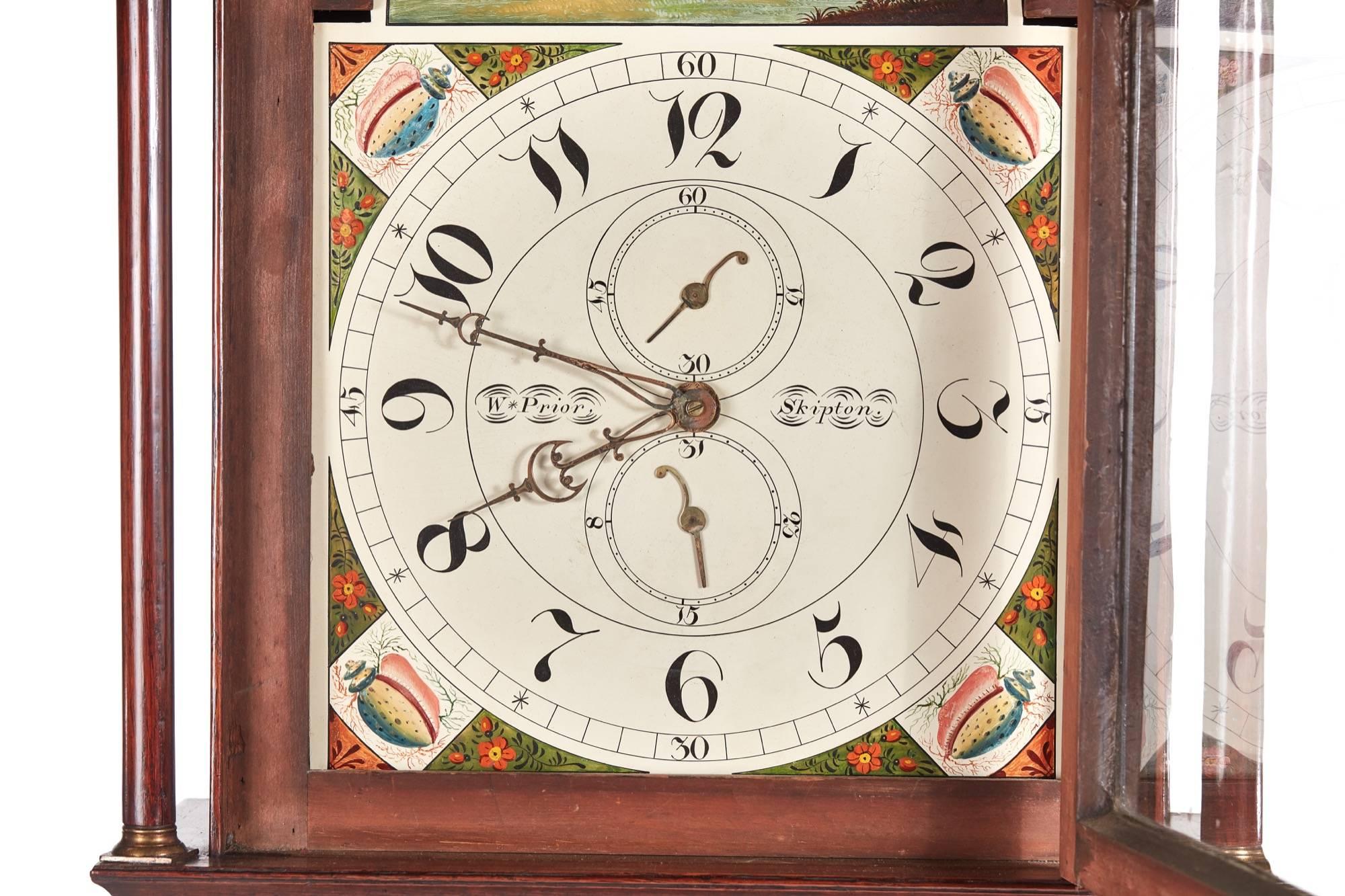 Antique oak and mahogany grandfather clock by W Prior Skipton, with a swan-neck pediment, lovely decorative arced painted dial with date and seconds dial, 30 hour movement striking the hour on a bell, lovely oak and mahogany case standing on
