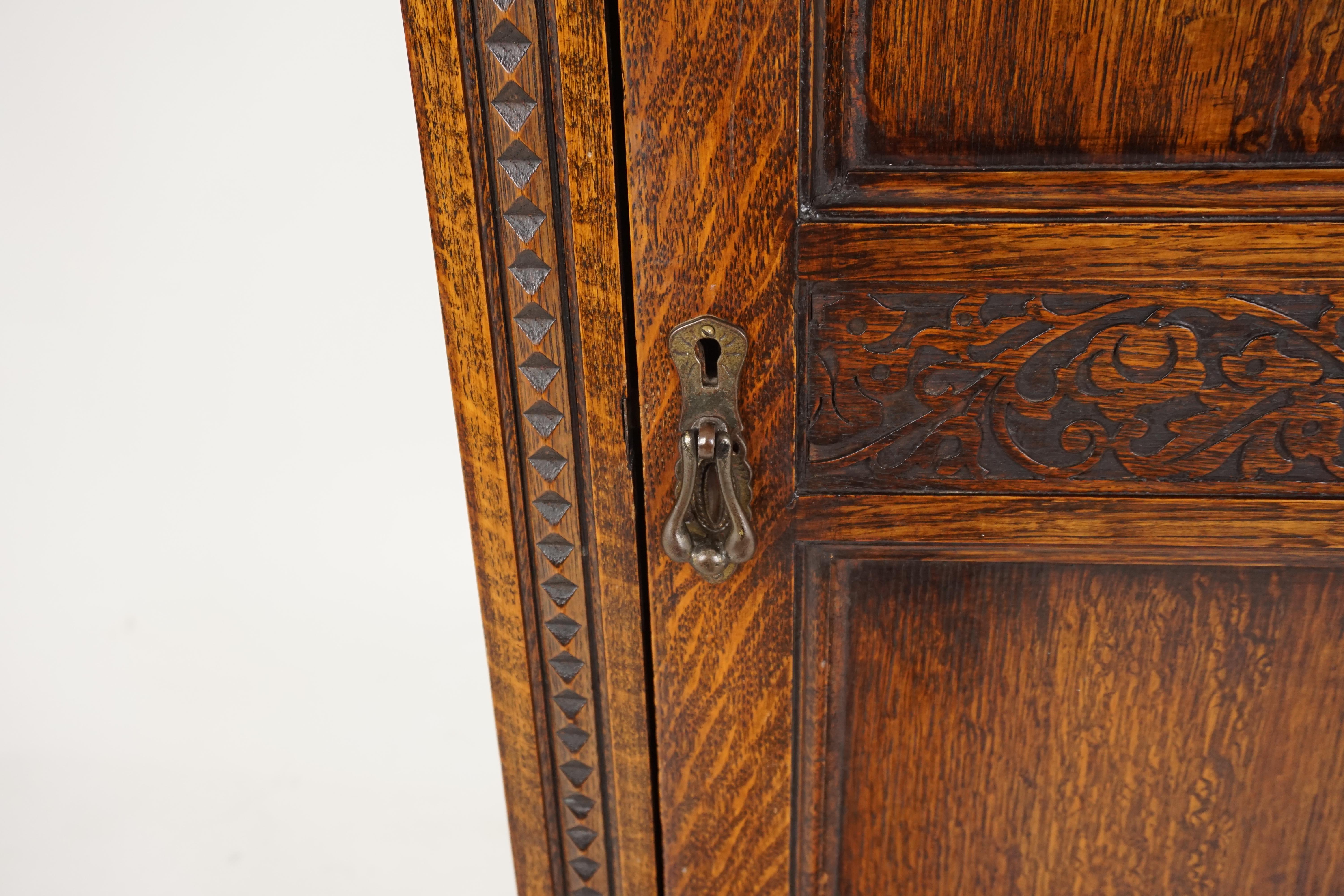 Antique oak Armoire, solid Tiger oak Jacobean Revival carved hall closet, Antique Furniture, Scotland 1910, B2015

Scotland 1910
Solid Oak
Original Finish
Carved Cornice
Single paneled door with carved corners at the top
Carved edge to the