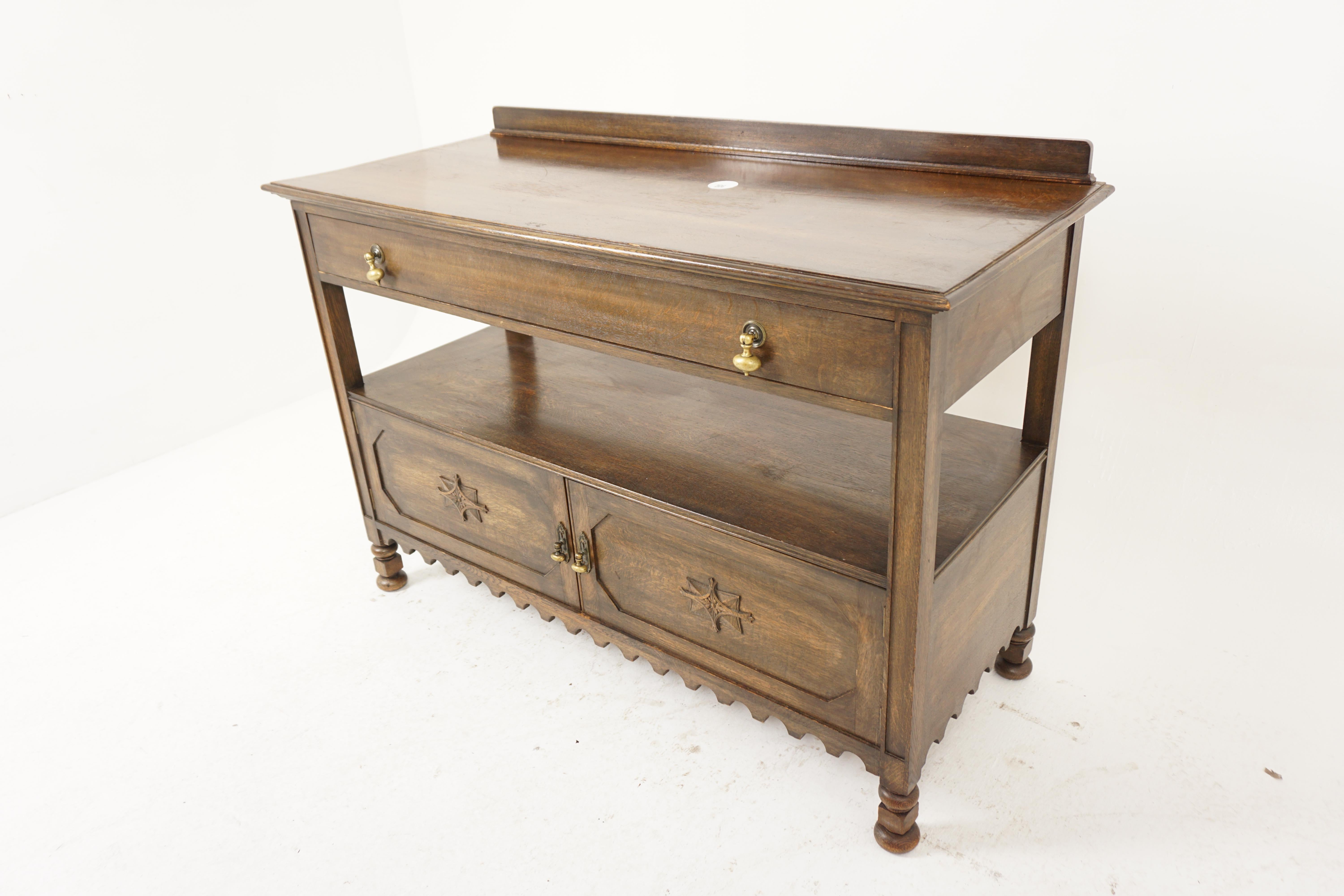 Antique Oak Arts & Crafts Hall Table, Serving, Sofa Table, Scotland 1910, H1029

Scotland 1910
Sold oak
Original finish
Rectangular moulded top with small gallery on the back
One large dovetailed drawer with large brass pulls
Shelf underneath with a