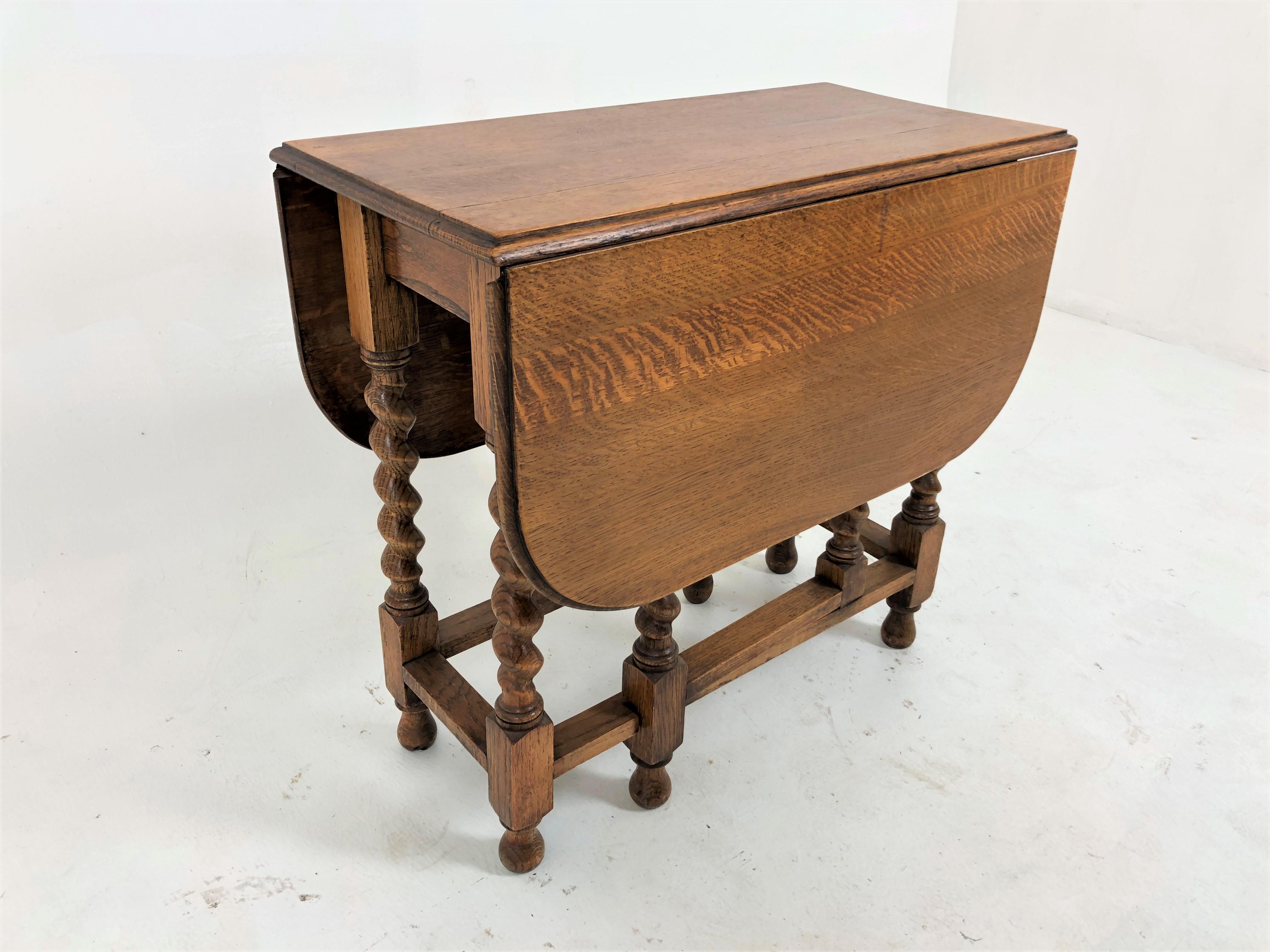 Antique oak barley Twist Gateleg table, drop leaf table, Scotland 1920, H757

Scotland 1920
Solid Oak
Original finish
Oak gateleg table with moulded edge
Pair of leaves to the side
All standing on very thick barley twist legs
Connected with