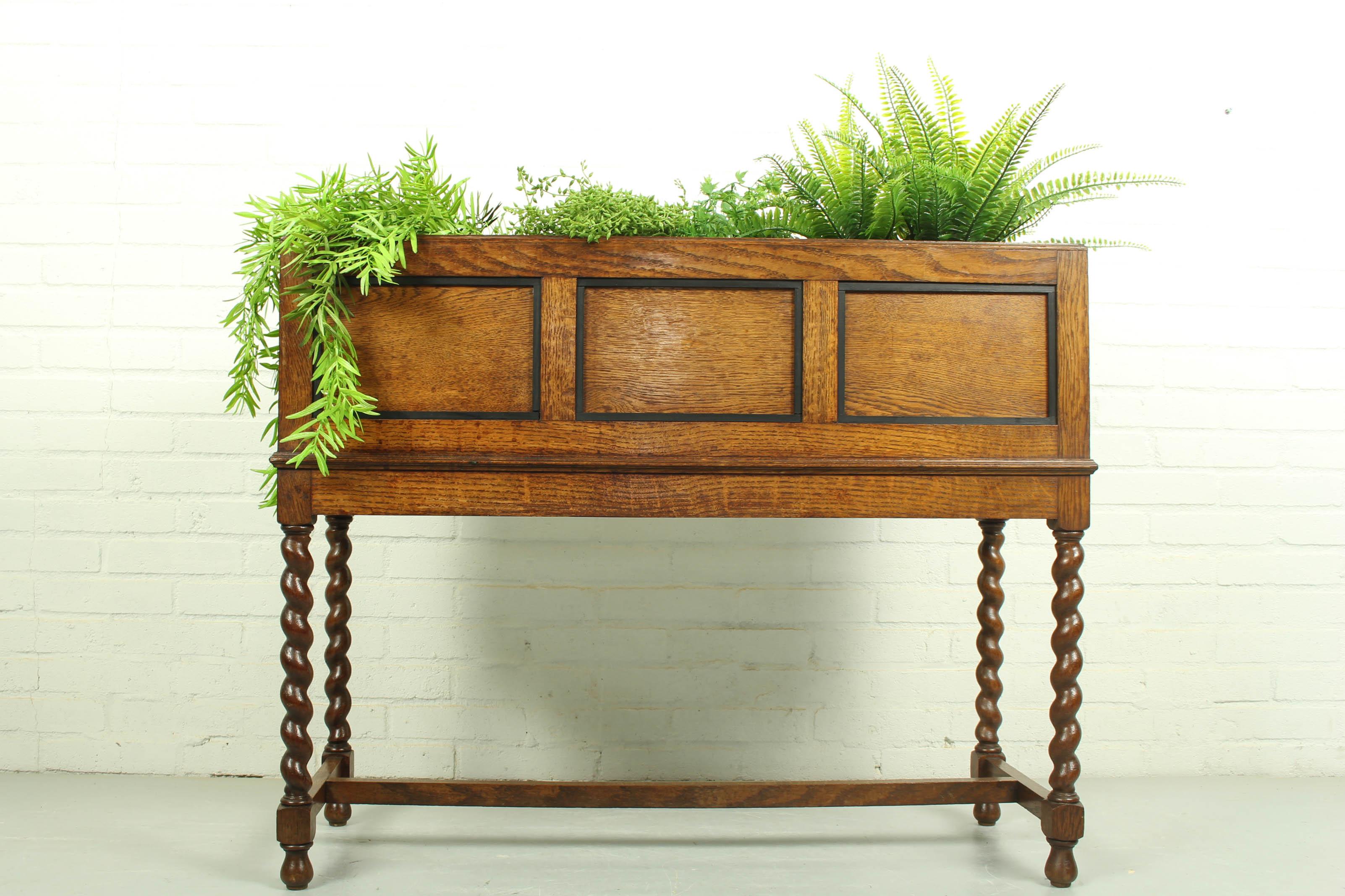 Antique oak Art Deco Jardinière/ Planter Box, 1920s. No inner box available, sturdy and stable and wood is in good condition. 

Dimensions: 75 cm H, 94 cm W and 34 cm D.
 