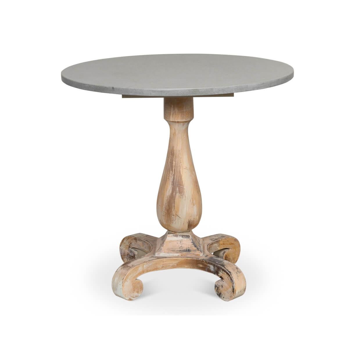 This piece embodies the charm of old-world craftsmanship meeting natural beauty. The table features an Antique Oak finish, showcasing the wood's natural grain and a story of time-honored use. The urn-shaped pedestal base stands with graceful poise,
