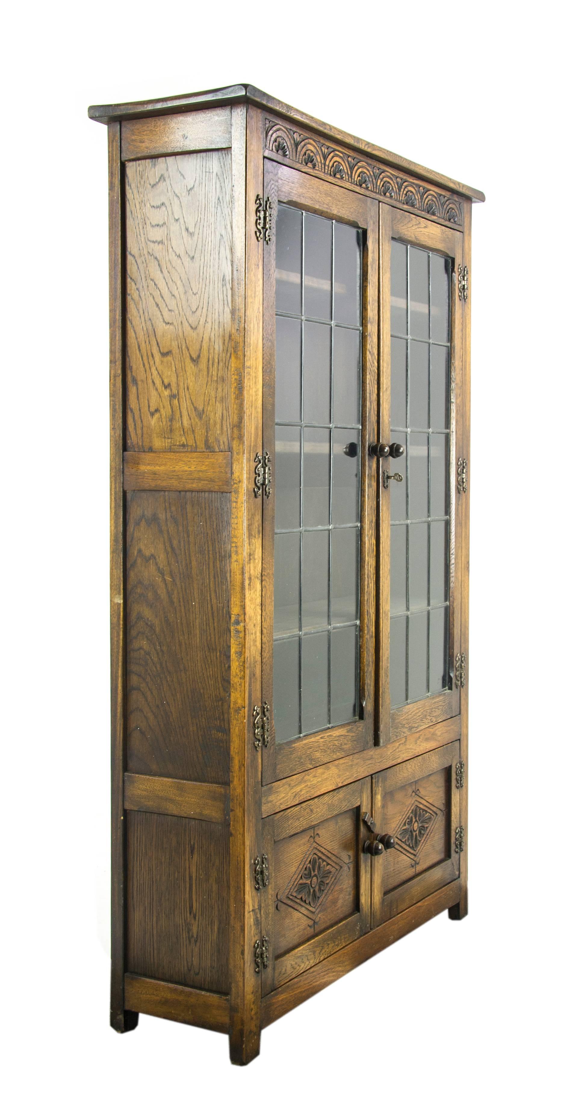 antique oak bookcase with leaded glass doors