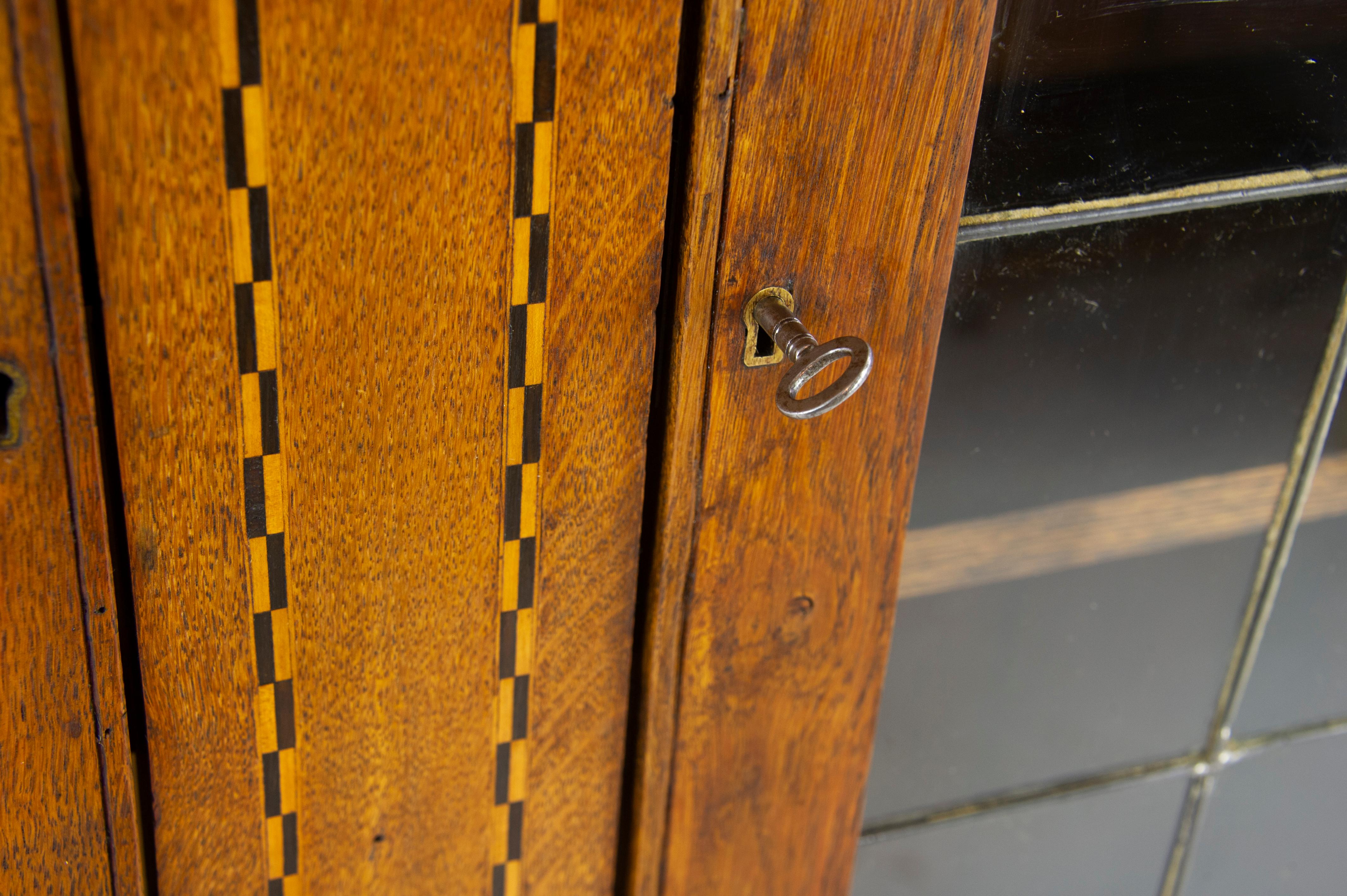 antique bookcase with leaded glass doors