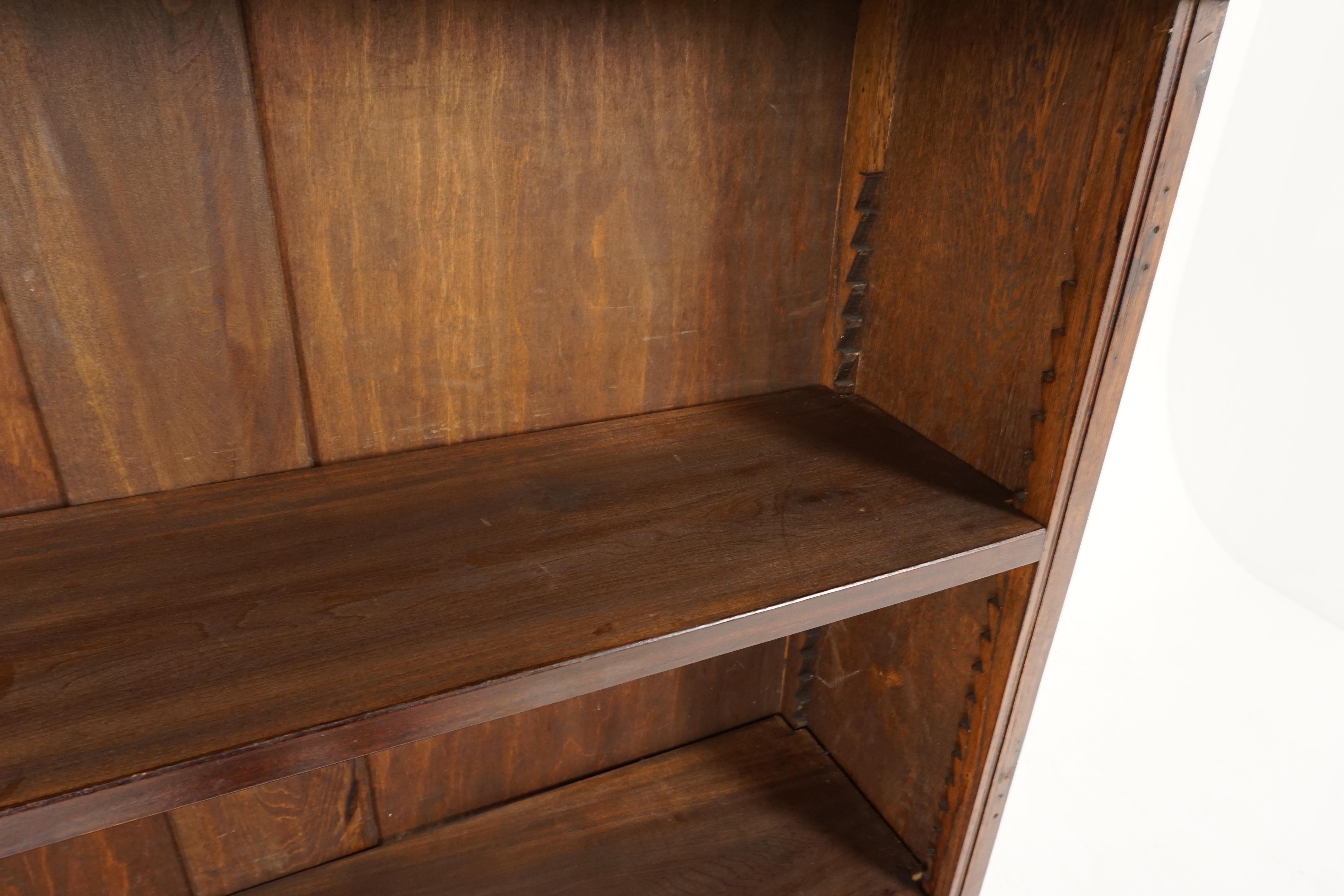 Antique oak bookcase, open display cabinet, Scotland 1920, B2222

Scotland 1920
Solid oak
Original finish
Rectangular moulded top
Carved frieze underneath
Pair of solid wooden graduating shelves
All standing on an open plinth base
Very good