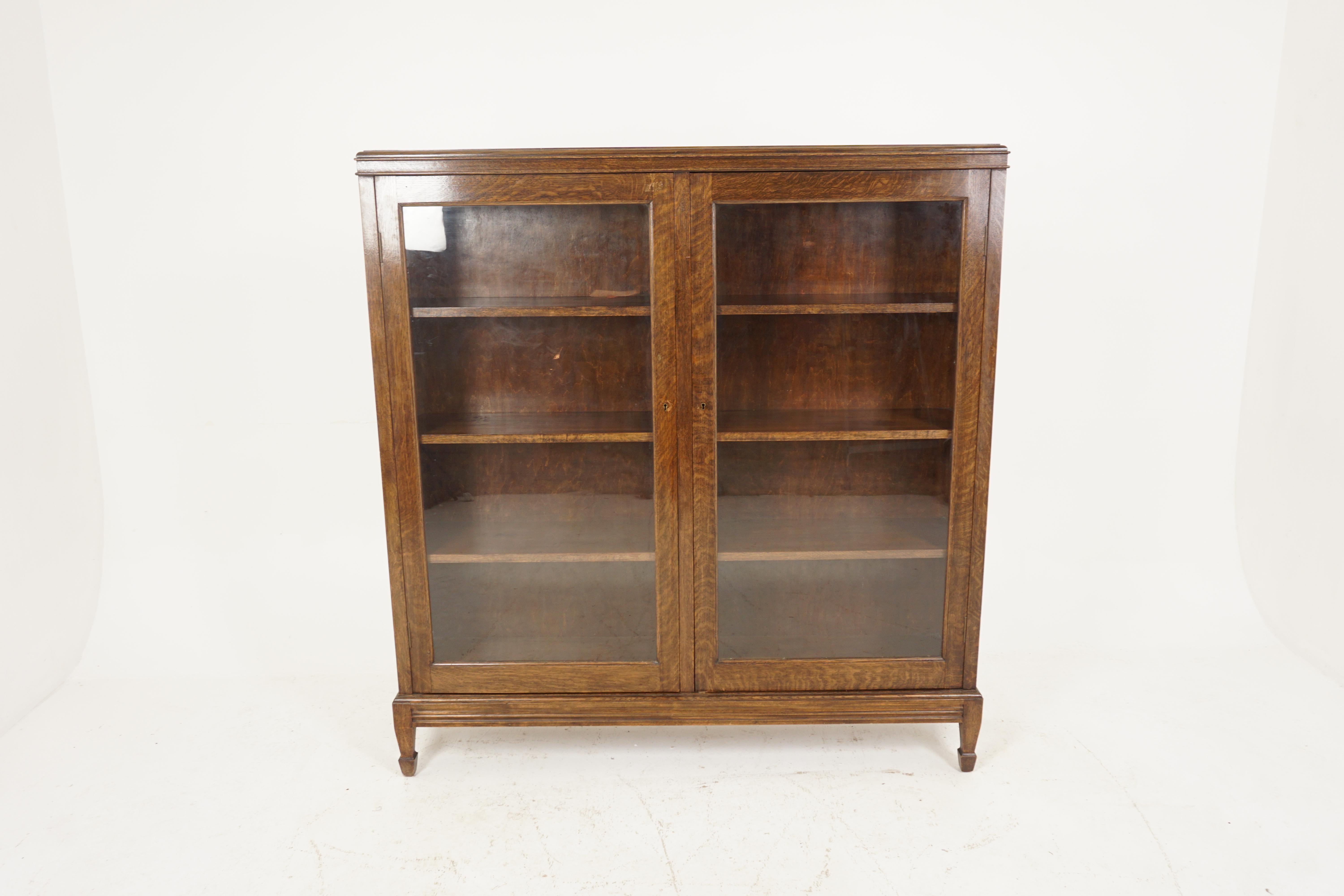Antique oak bookcases, Arts + Crafts, display cabinet, Scotland 1910, B2616

Scotland 1910
Solid oak.
Original finish.
Rectangular top.
Pair of original glass doors.
With three shelves.
Original lock and key.
All standing on shaped tapered