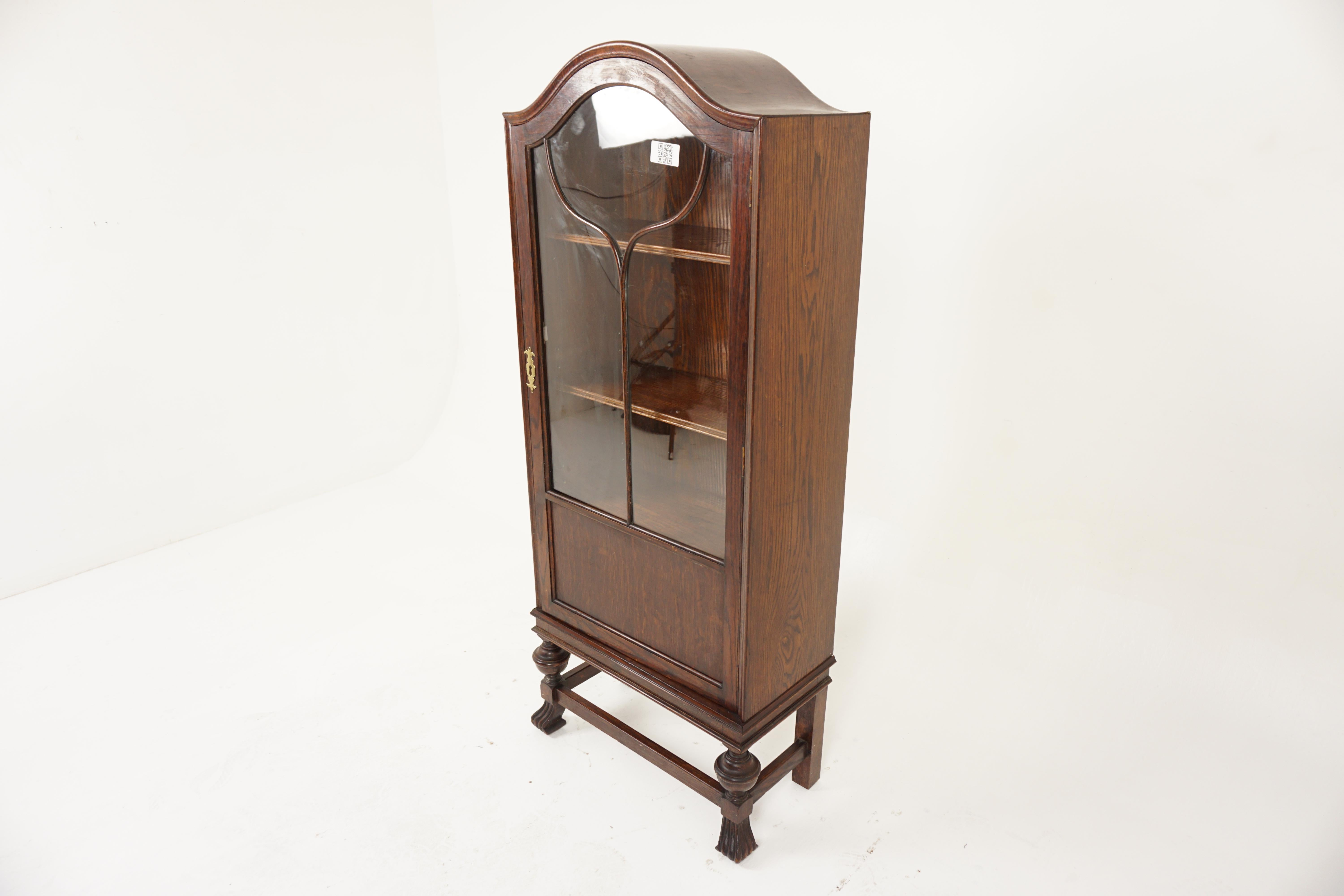 Antique Oak Bow Top Art Deco Bookcase, Display Cabinet, Scotland 1920, H987

Solid Oak
Original finish
With dome shaped top
Single original glass door with moulding in the front
Opens to reveal three adjustable shelves
Brass escutcheon but is