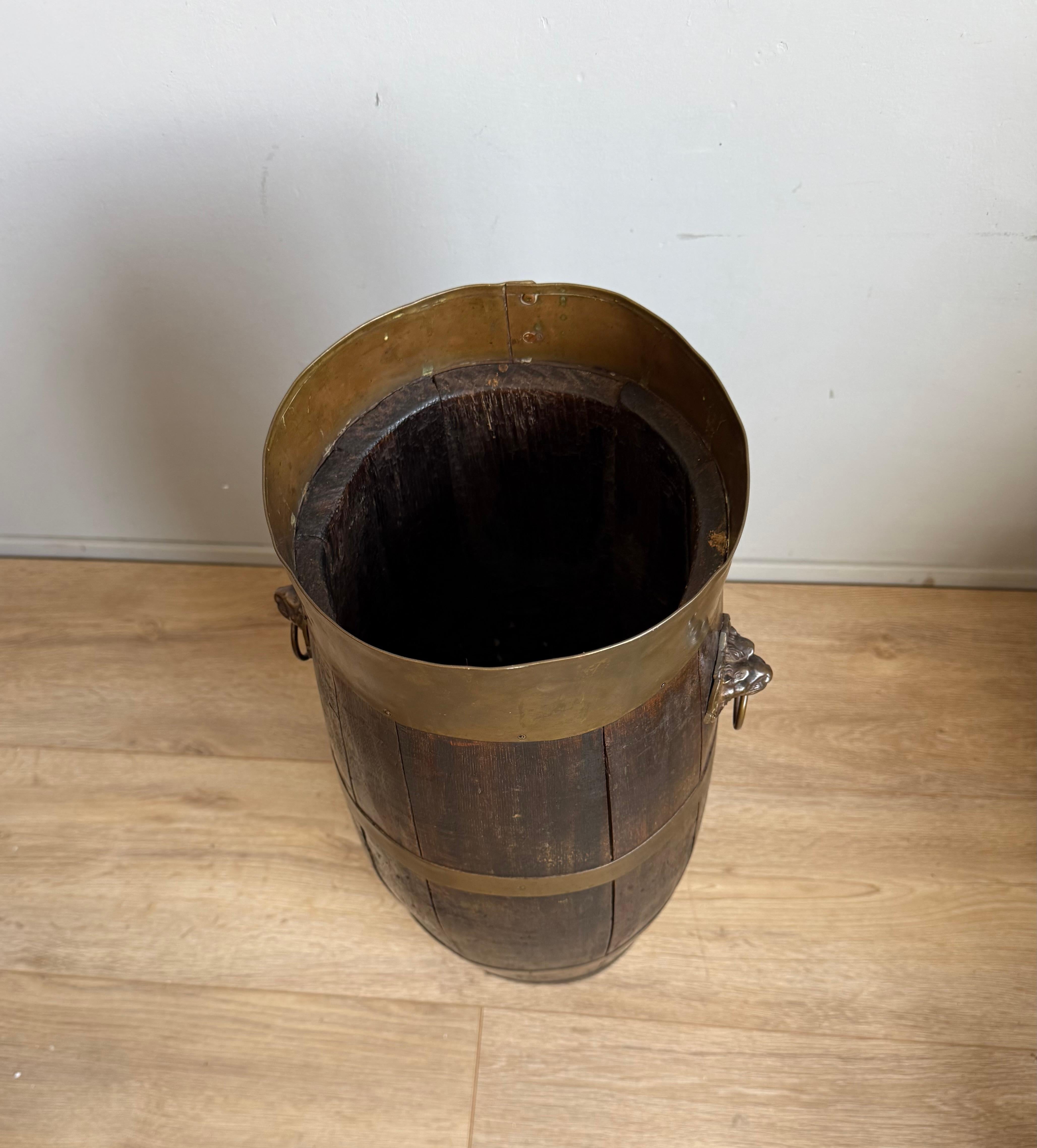 20th Century Antique Oak & Brass Barrel Shape Umbrella or Stick Stand with Lion Head Handles For Sale