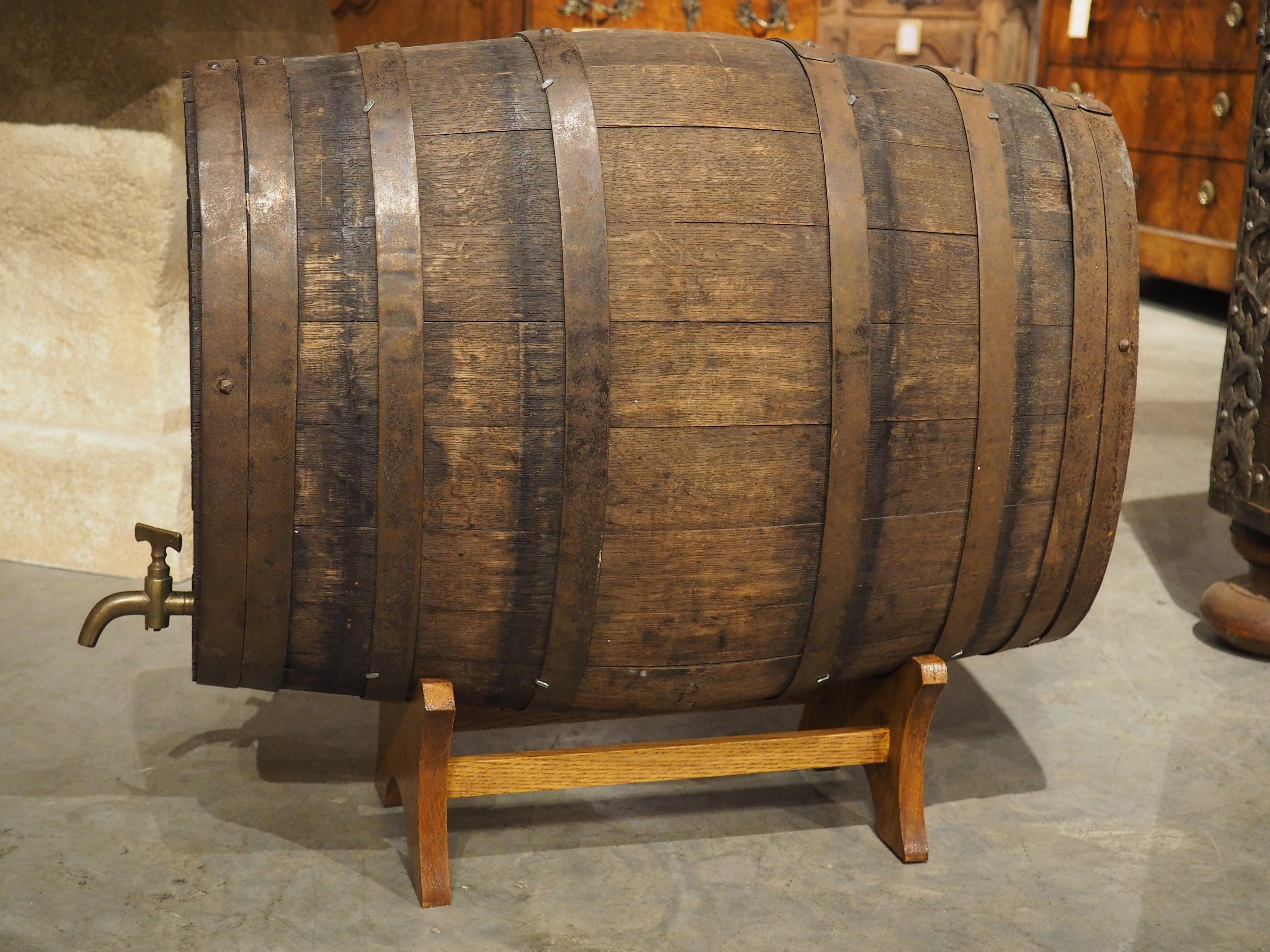 A must-have for any wine lover, this oak calvados barrel was hand-carved in France, circa 1850. Calvados is an apple and pear brandy specifically manufactured in Normandy, with the first known record of production dating to 1553. The ovate barrel is