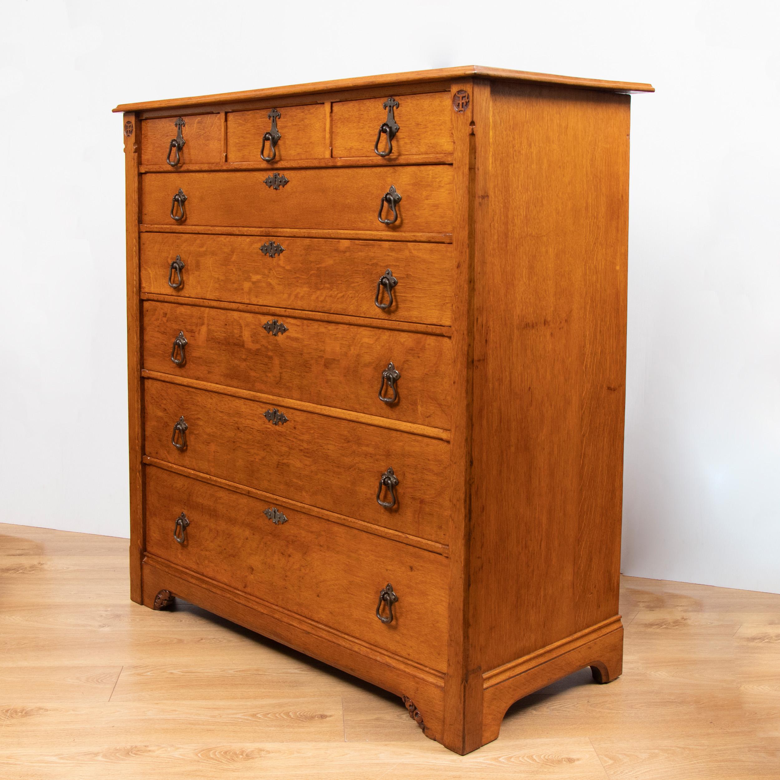 Five graduating drawers with three small top drawers above
Hand carving detail to top corners and apron. Stamped Gillows.
In the manner of AWN Pugin furniture designed for the Palace of Westminster also bearing the carved f initial.


 