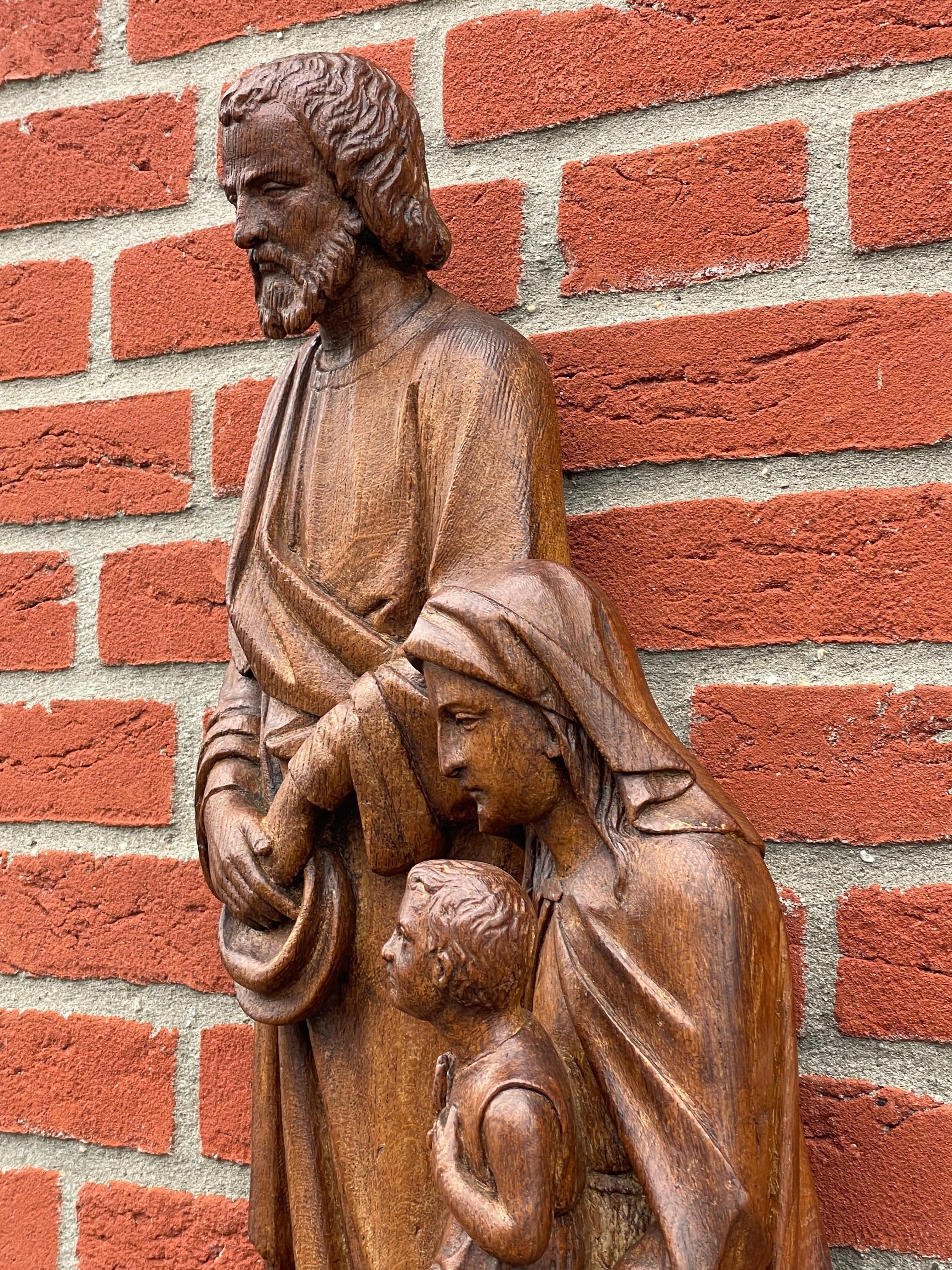 Metal Antique Oak Church Wall Sculpture of Joseph, Mary & Child Jesus Raising Fingers