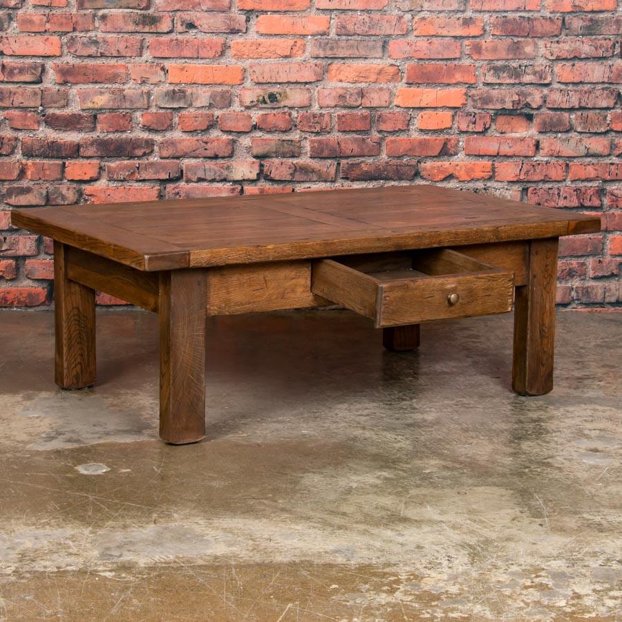 This antique oak coffee table has substantial presence due to the almost 2