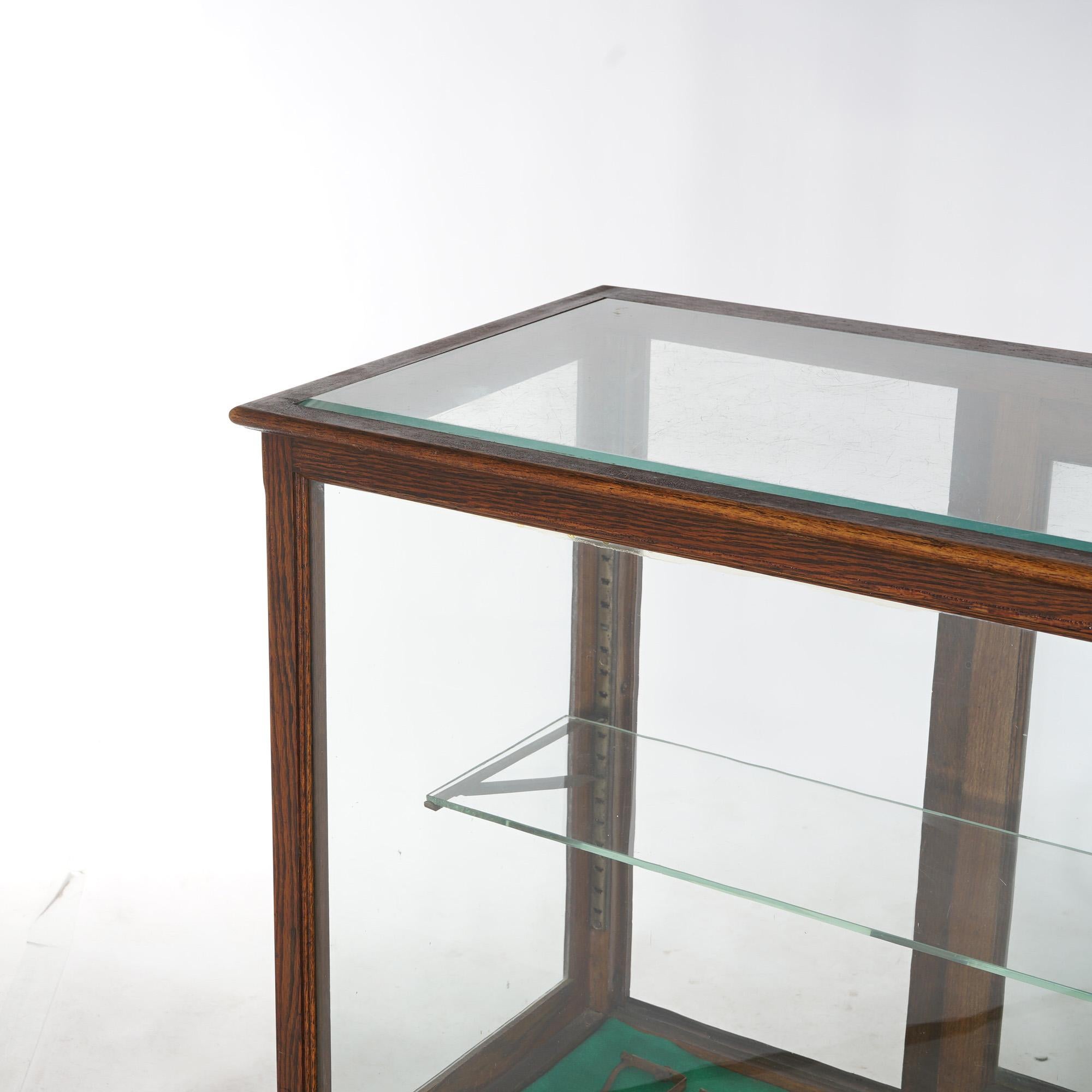 Antique Oak Country Store Display Case, Floor Model, Signed Saginaw, c1920 In Good Condition In Big Flats, NY