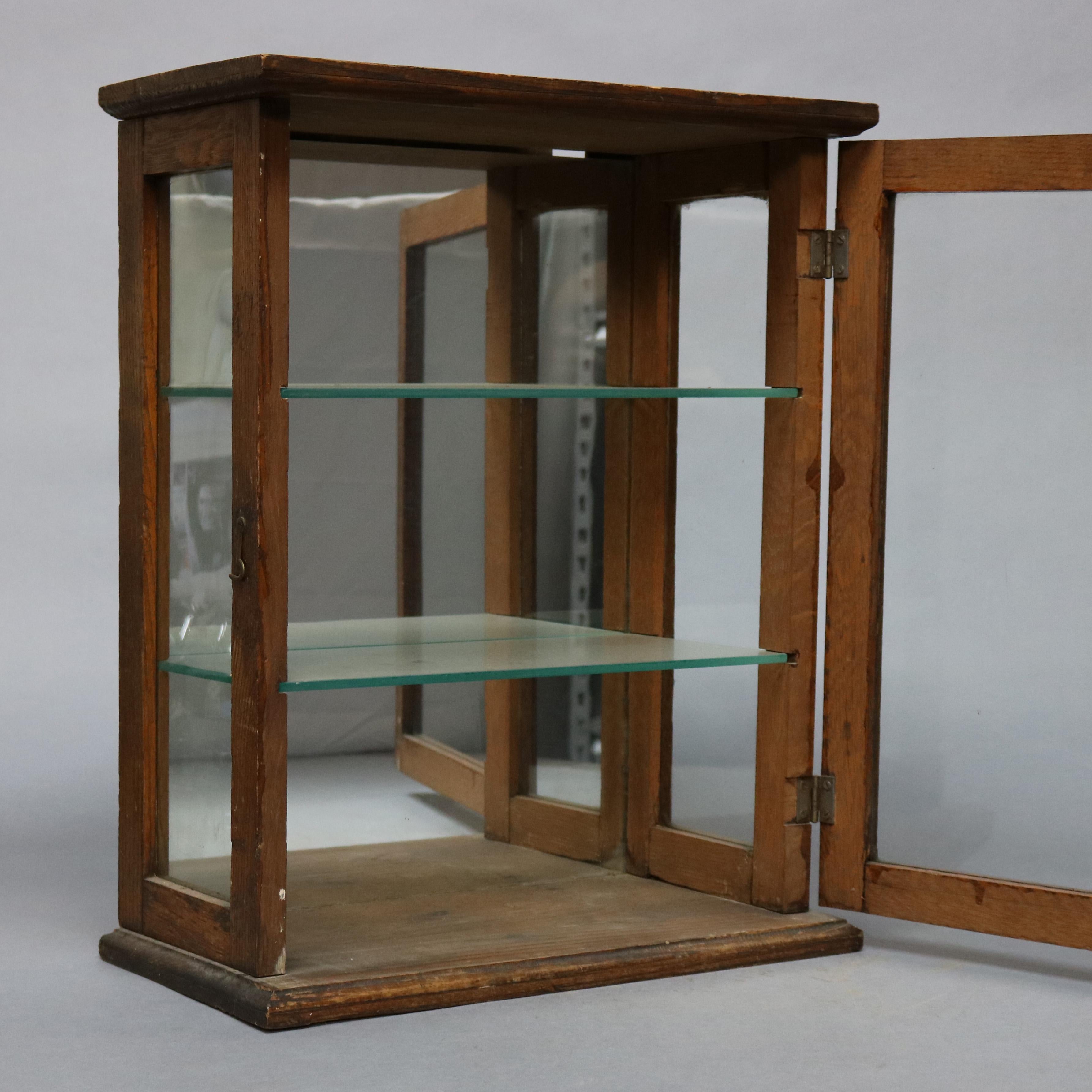 Carved Antique Oak Country Store Mirrored Display Cabinet, circa 1900