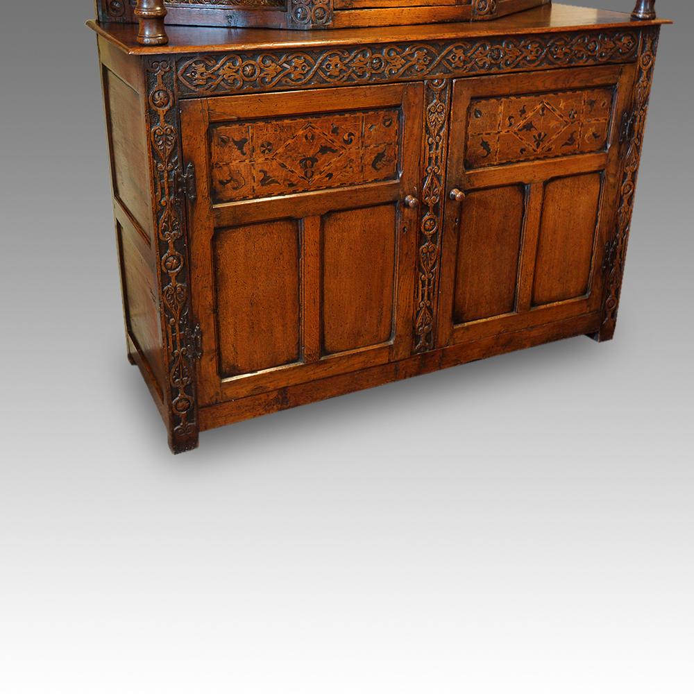 Antique oak court cupboard
This antique oak court cupboard was made circa 1890-1910 
The cabinetmaker used a design that included all the best features of the Elizabethan period that you would require when purchasing such a cabinet.
At the end of