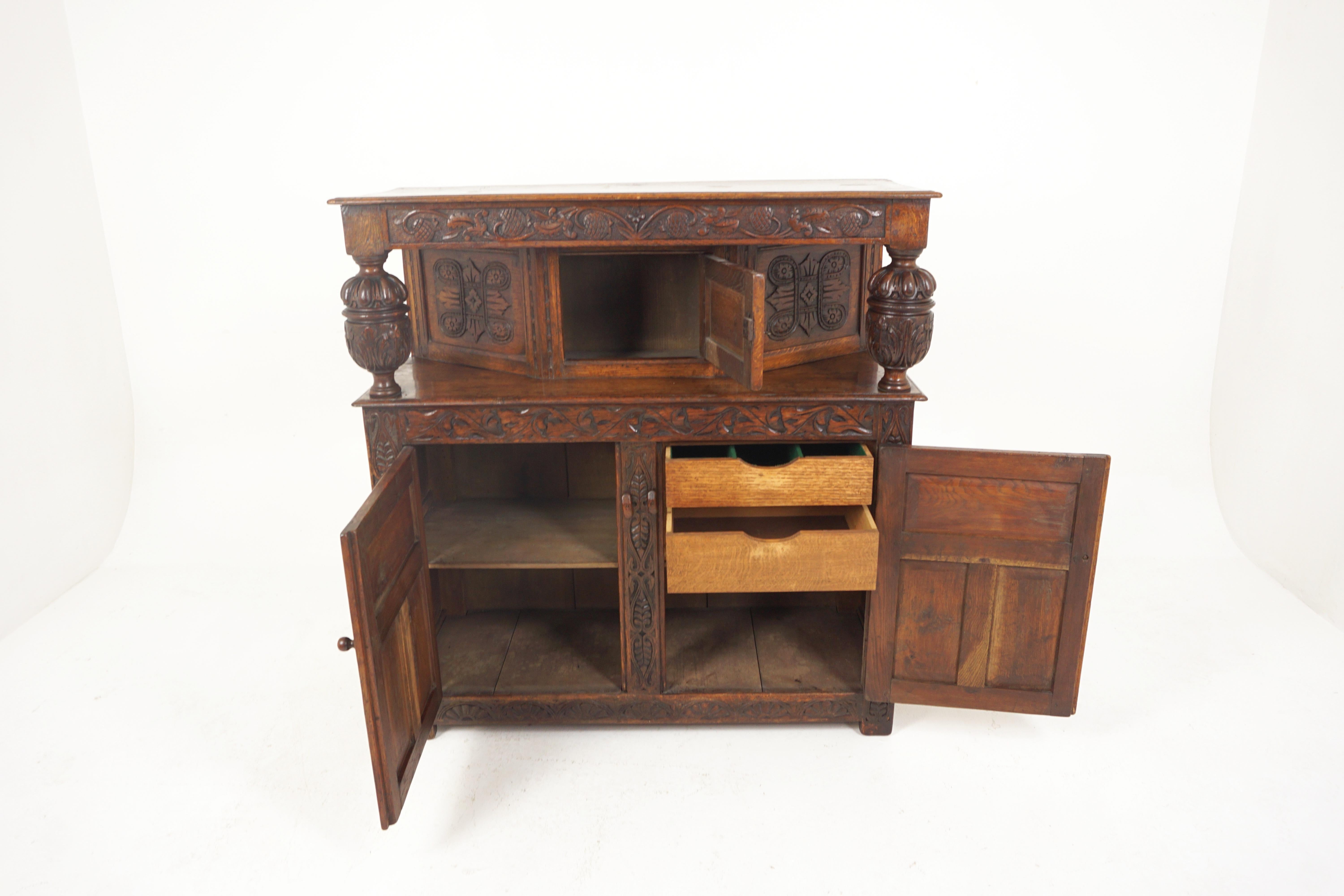 Antique Oak Court cupboard, sideboard, buffet, Scotland 1910, B2667

Scotland 1910
Solid oak
Original finish
Solid oak top with moulded edge
Having carved detail under
The shaped top has a single carved panel door
Door opens to reveal