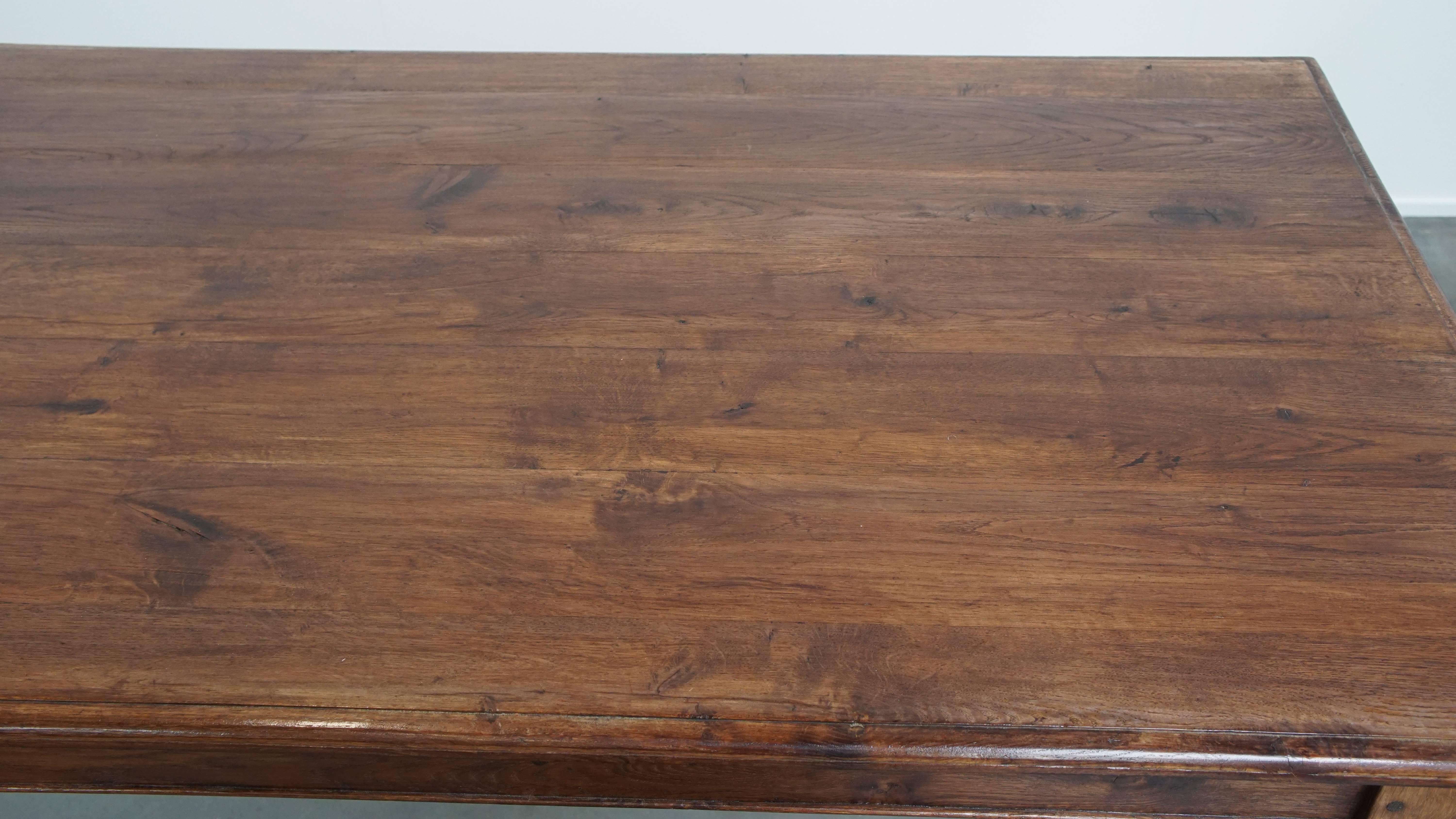 Antique oak dining table from early 1900 with a drop-leaf on one side For Sale 5