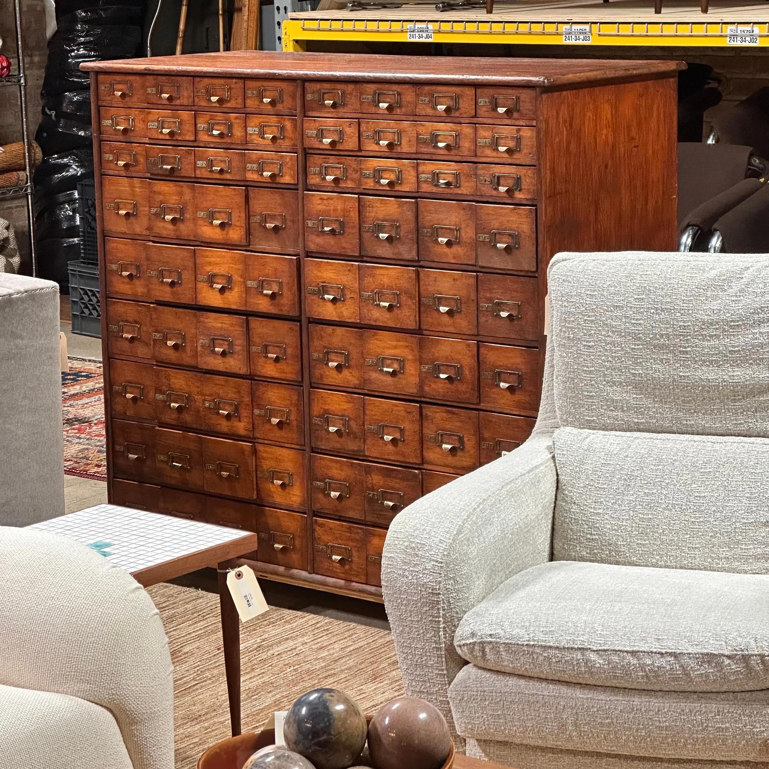 Antique Oak Double-Sided File or Parts Cabinet on Casters

A truly spectacular piece! This rare and unusual antique oak file/parts cabinet has drawers on BOTH sides. These pieces are hard to find, and this one has been restored back to mint
