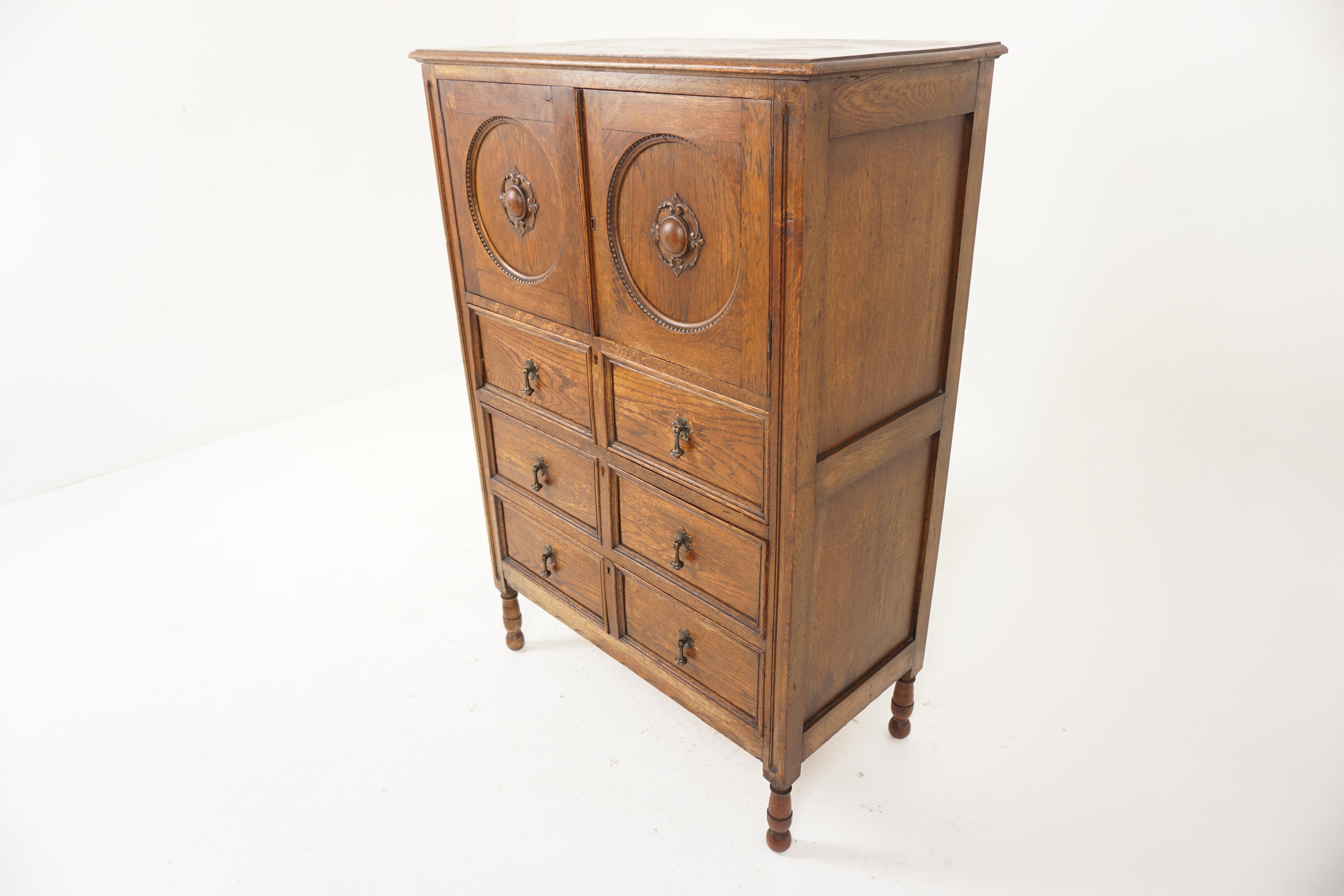 Antique Oak Dresser, Vintage Tiger Oak Bachelor Chest, Chest of Drawers, Antique Furniture, Scotland 1920, H135

+ Scotland 1920 
+ Solid Oak
+ Original Finish
+ Rectangular moulded top 
+ Pair of panelled doors with circular design and carved
