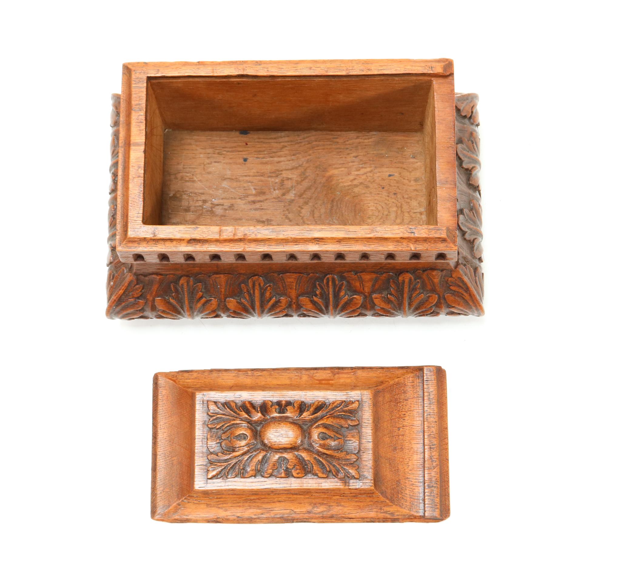Stunning and rare Antique decorative box.
Striking Dutch design from the 19th century.
Solid oak with nicely hand-carved elements.
The original top of the box slides off.
This wonderful Antique decorative box is in good original condition.
with