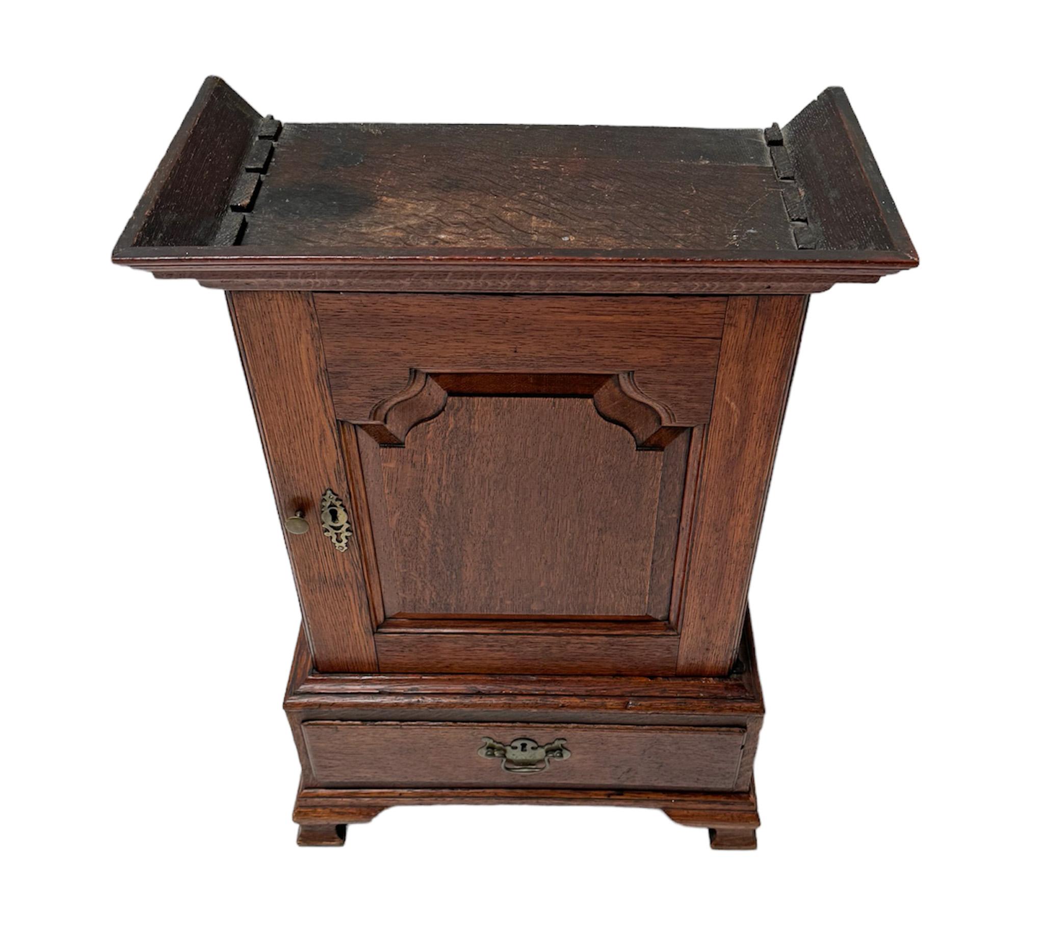 Magnificent and rare in the style of George III miniature art cabinet with fourteen inner drawers!
Striking English design from circa 1840.
Solid oak base with original brass handle on the drawer.
Thirteen inner drawers with original brass knobs and