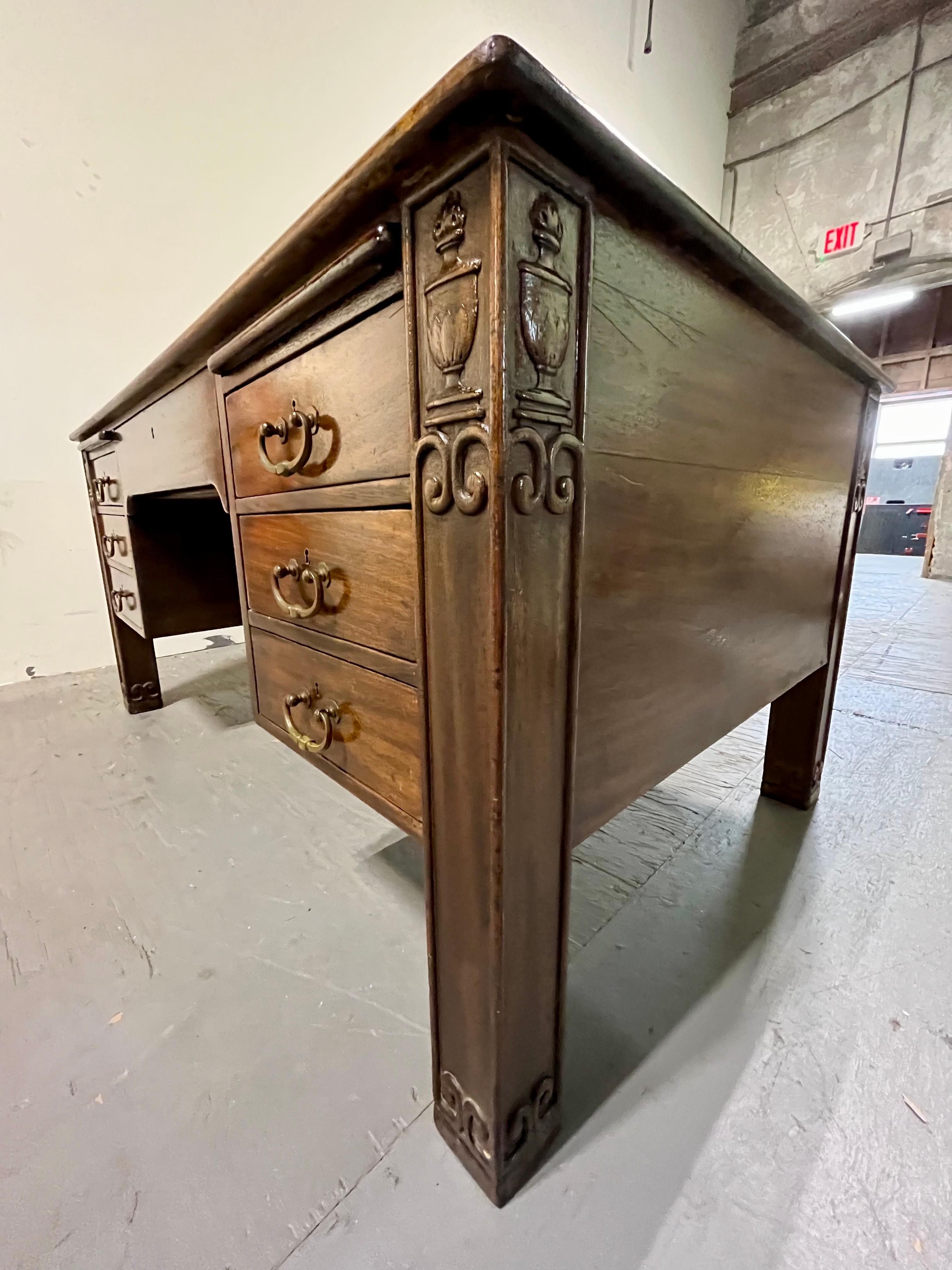 Impressive English Arts and Crafts partners desk with 14 drawers and 4 pull out writing surfaces. Classic detail with urn and scroll accent. Substantial presence.
Curbside to NYC/Philly $400