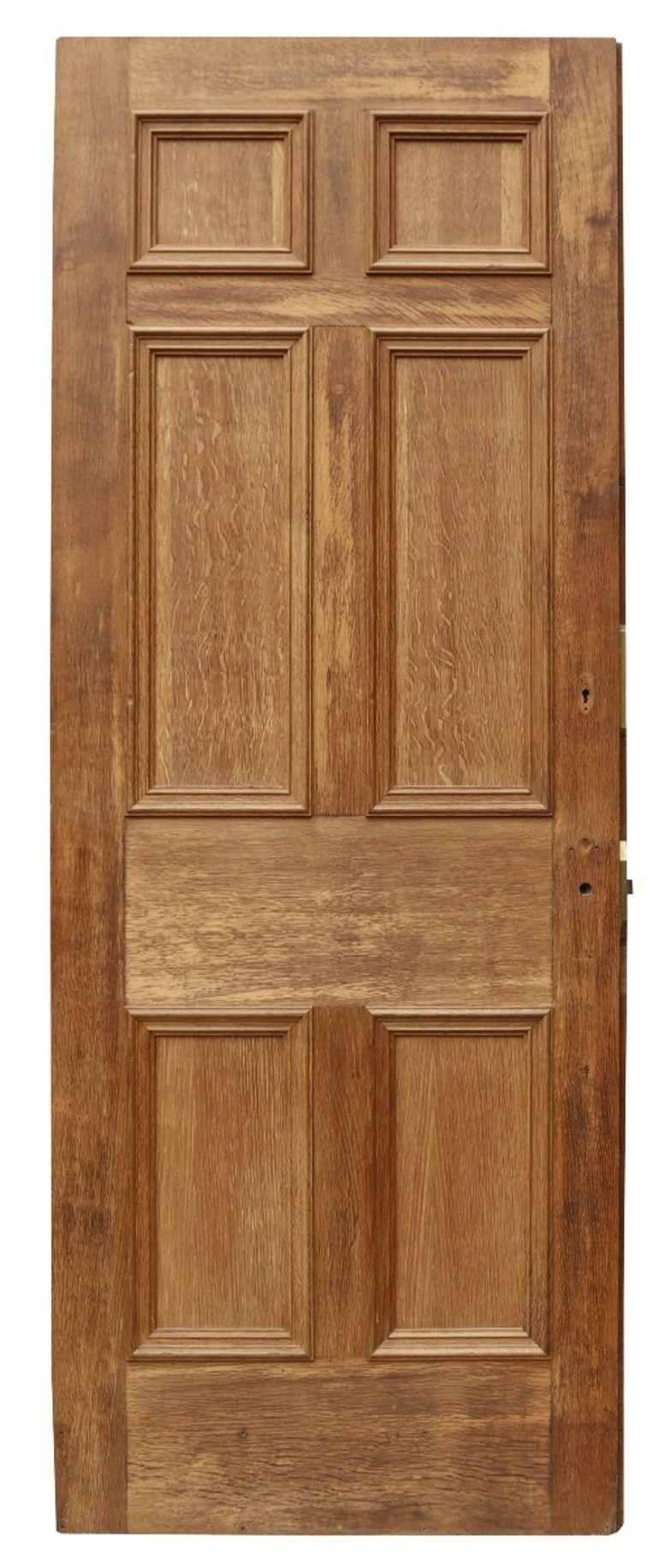 A reclaimed six panel front door constructed from oak.