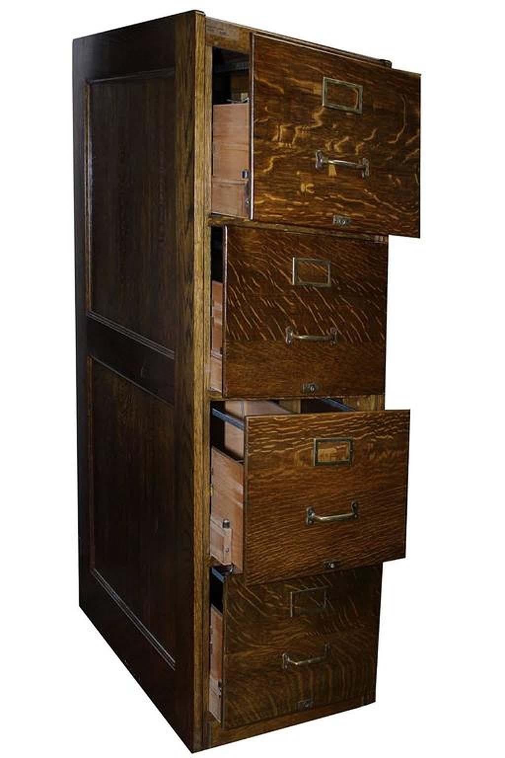Mint condition quarter sawn oak file cabinet. This piece is in such good condition it is hard to believe. Inside and out is it near perfect, It has been refinished in the last 20 years and done really well. Original Brass handles and details, four