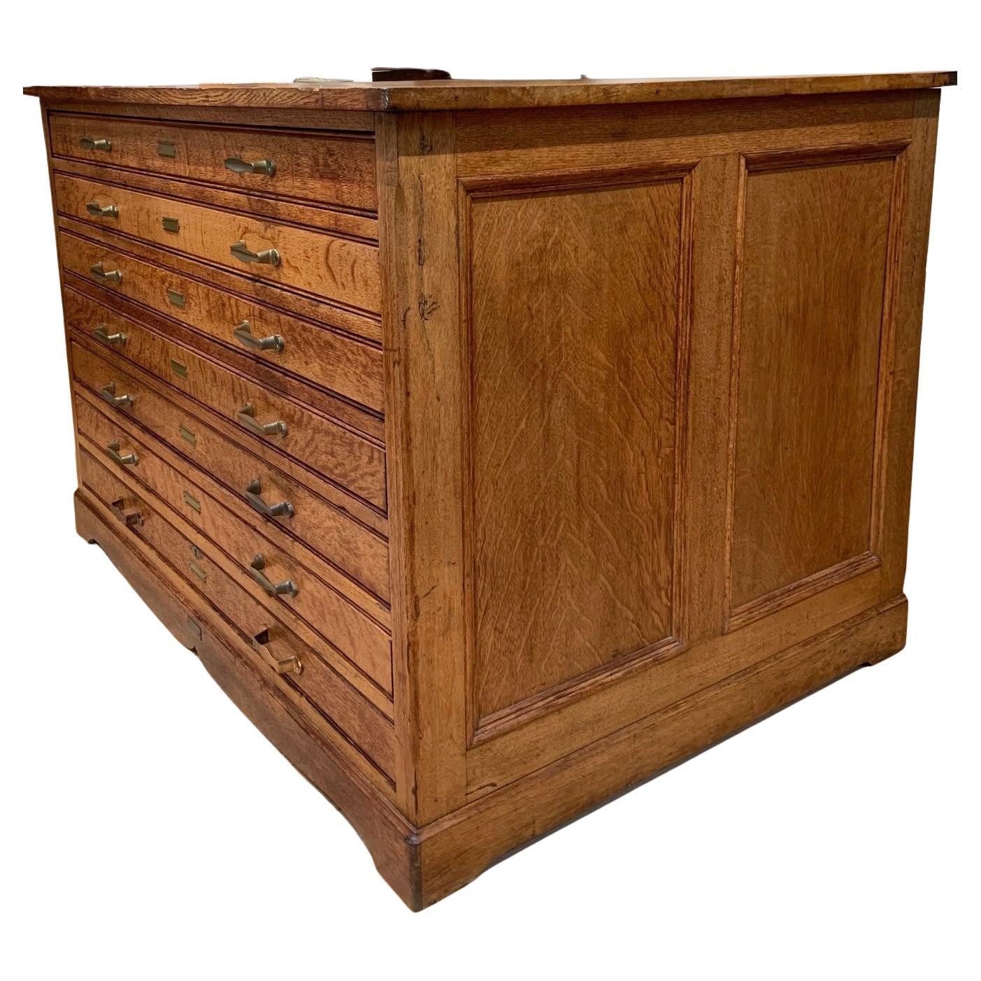 Large American Keuffel And Esser Flat File Cabinet, Early 20th century

This is an exceptional flat file cabinet made by Keuffel & Esser Co. of New York, most likely in the early 1900s. It has seven drawers: six divided into two 20.5