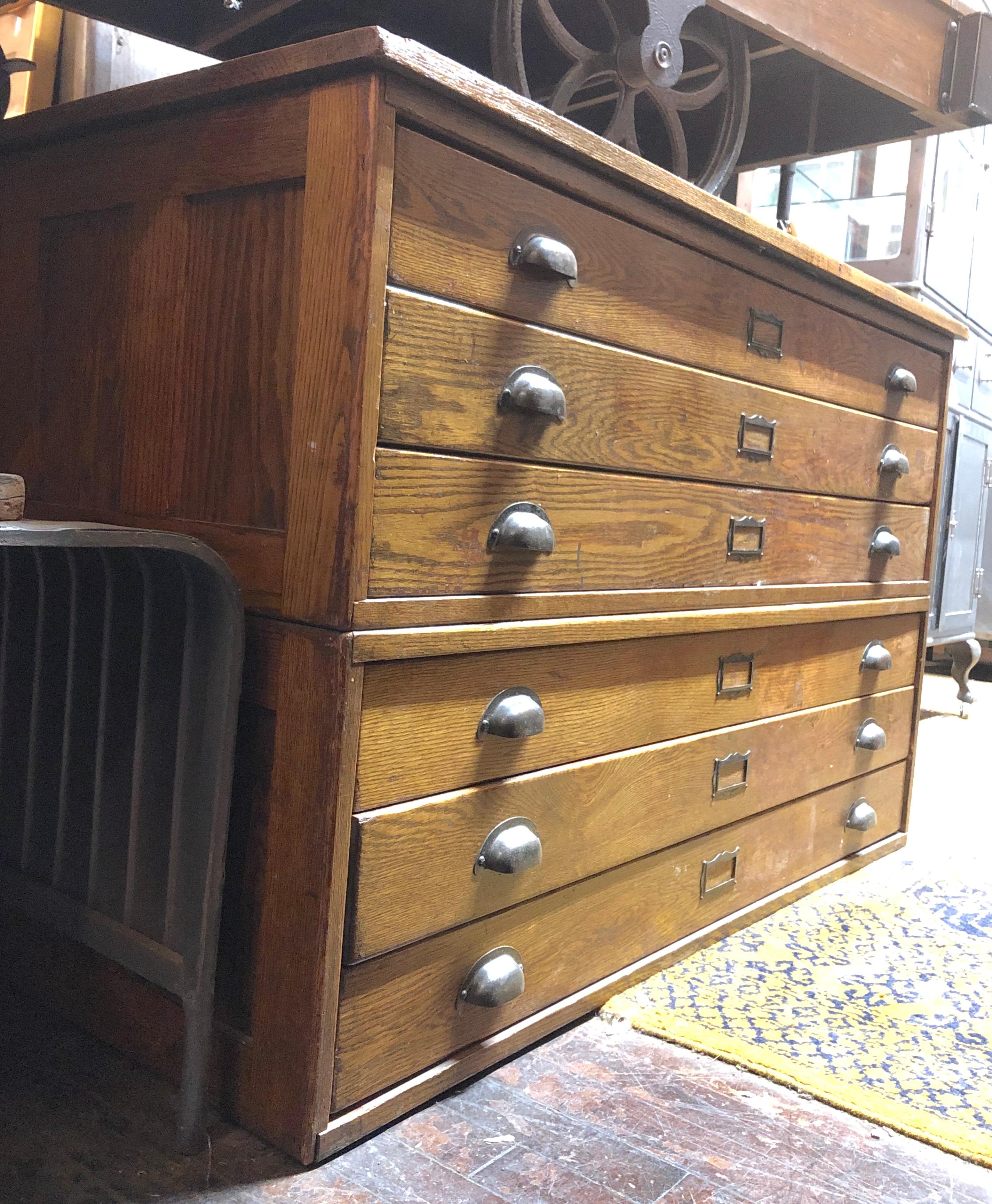 Double stack flat file cabinet with golden oak wood and brass hardware.
Drawer dimensions: 42