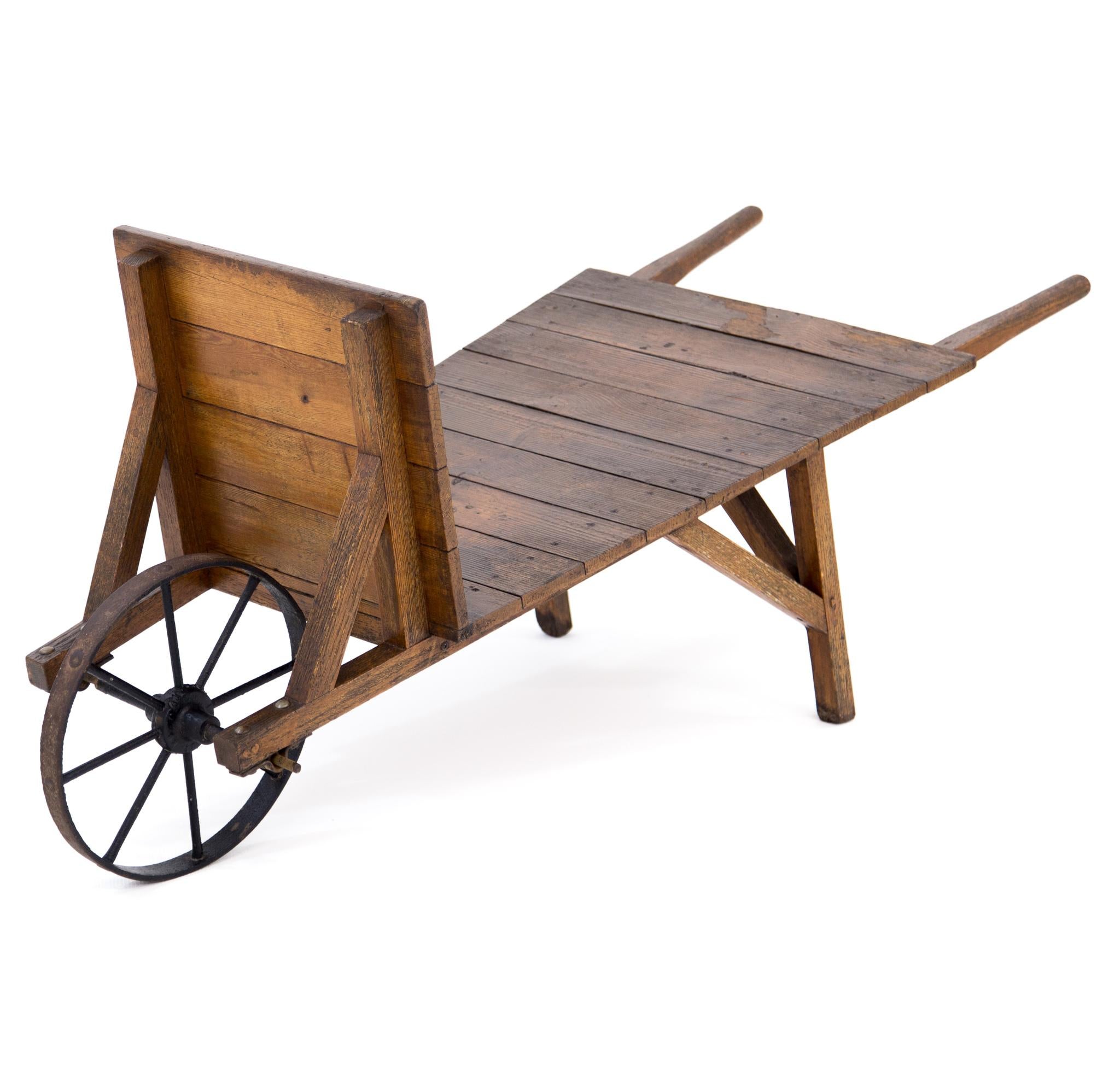 vintage wheelbarrow with metal wheel