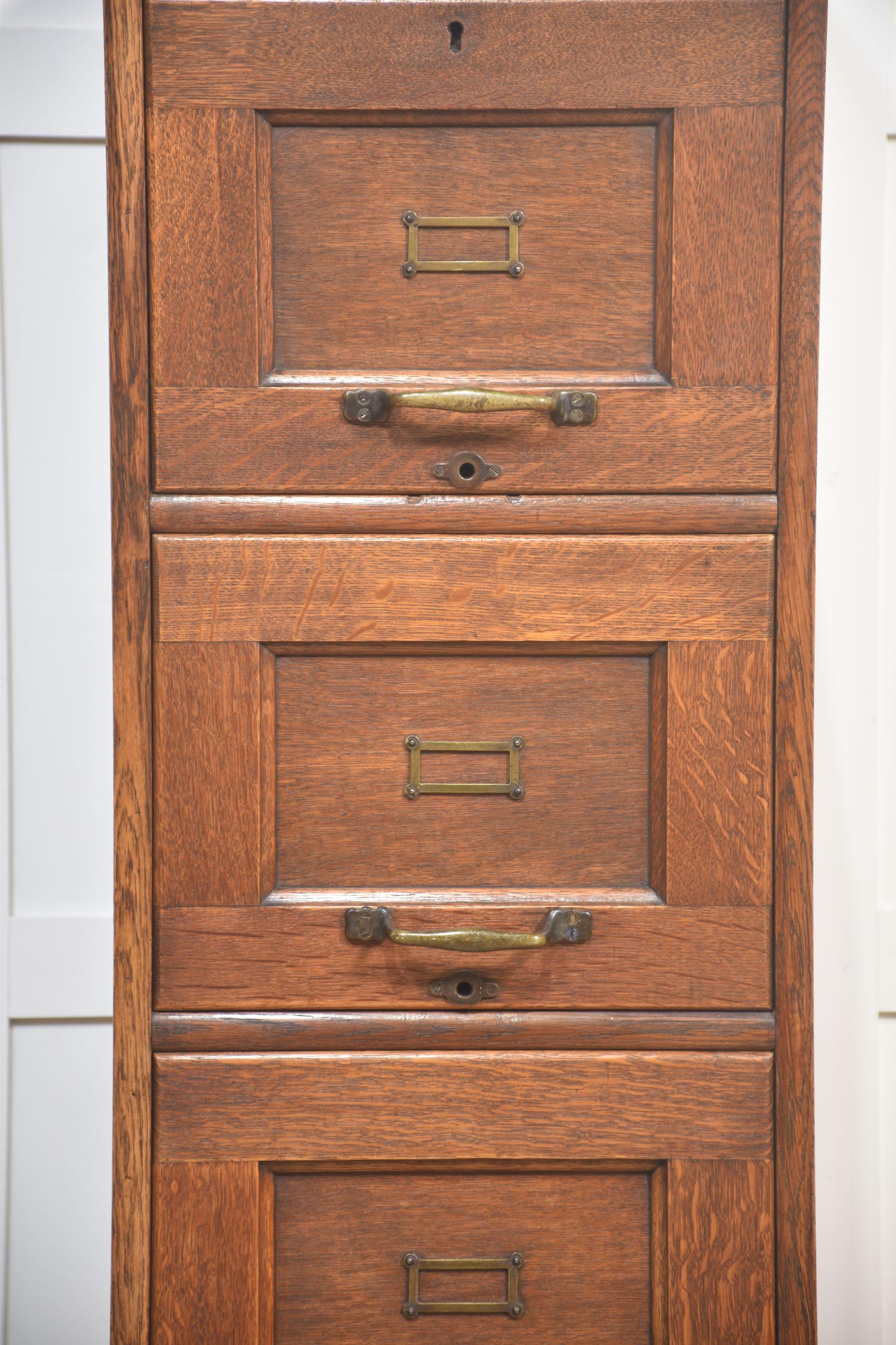 Antique Oak 4-Drawer Filing Cabinet
Bring timeless character and practical storage into your home or office with this antique oak filing cabinet. Featuring four smooth-sliding drawers, complete with brass handles, label holders, and traditional
