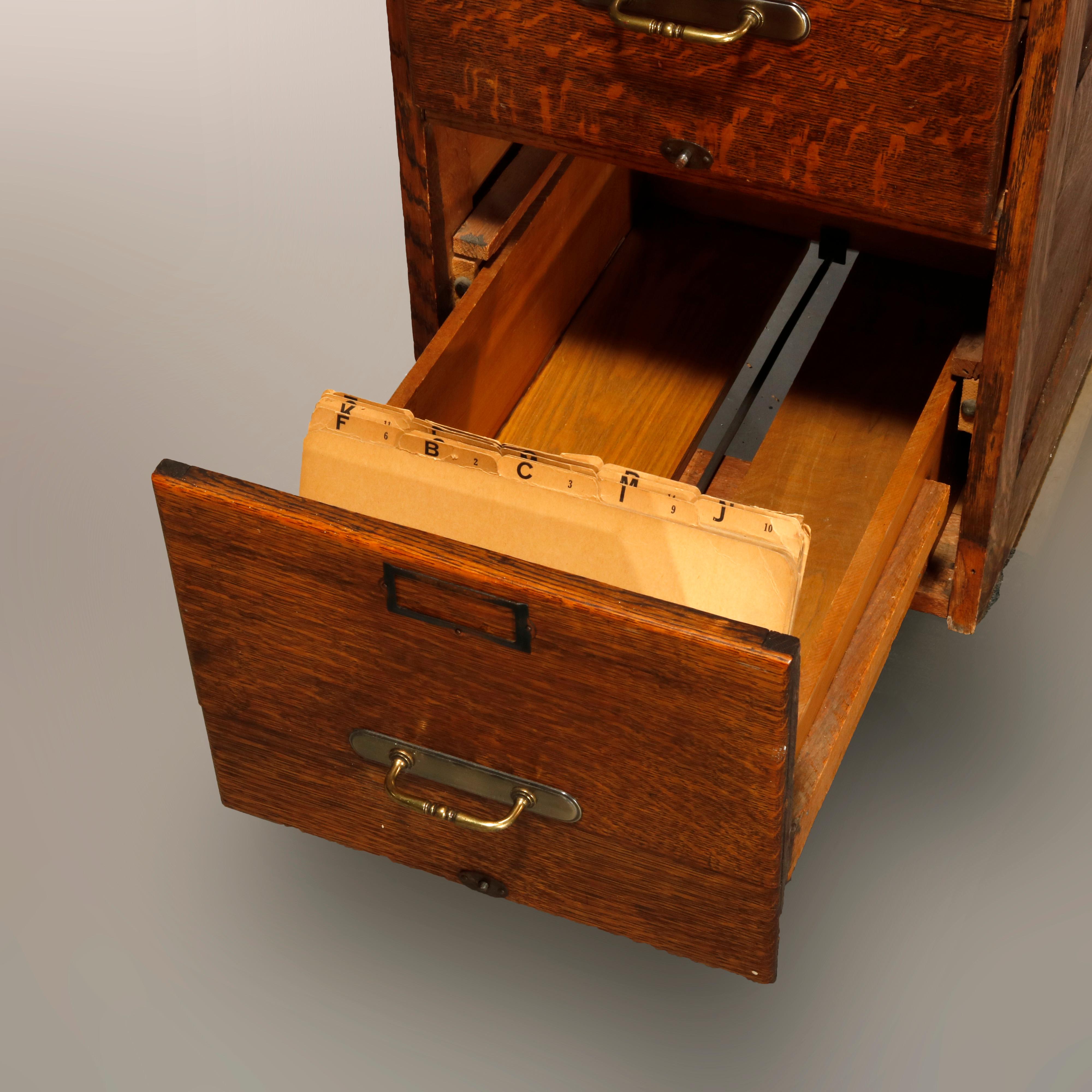 Metal Antique Oak Four-Drawer Paneled Filing Cabinet, circa 1900
