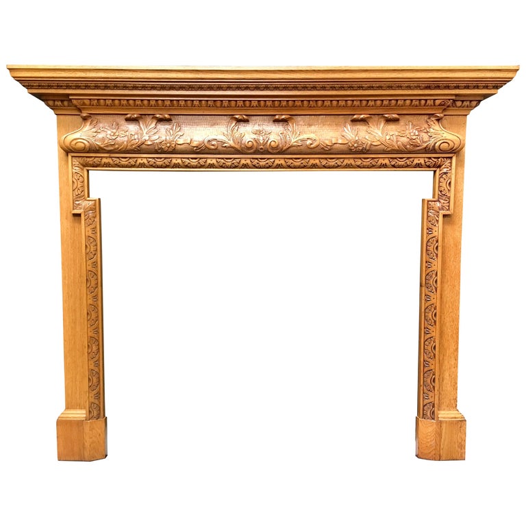 Antique Oak Style Carved Wood Fireplace Surrounds For Sale at