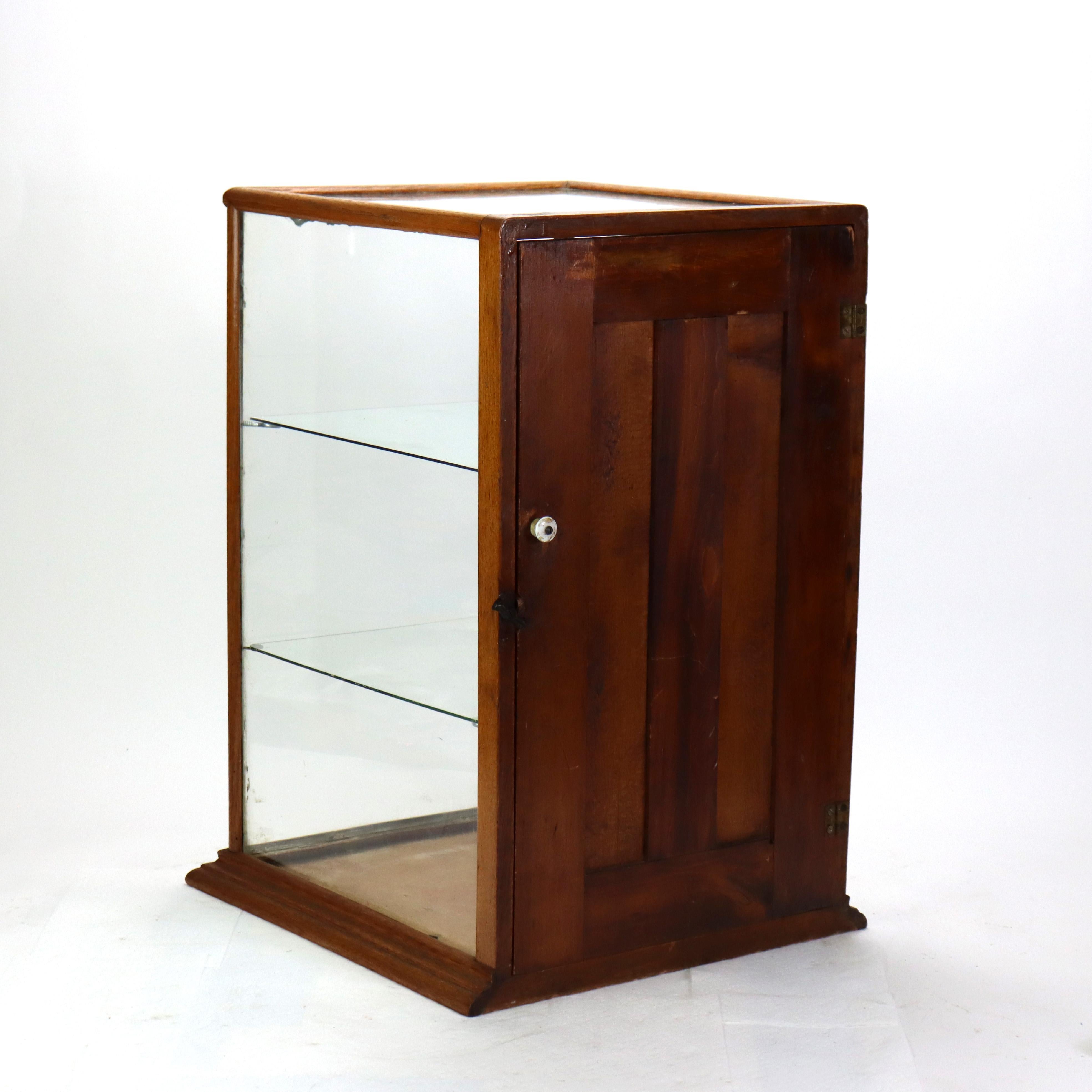Vitrina antigua de roble y cristal para tienda de campo c1920 siglo XX en venta