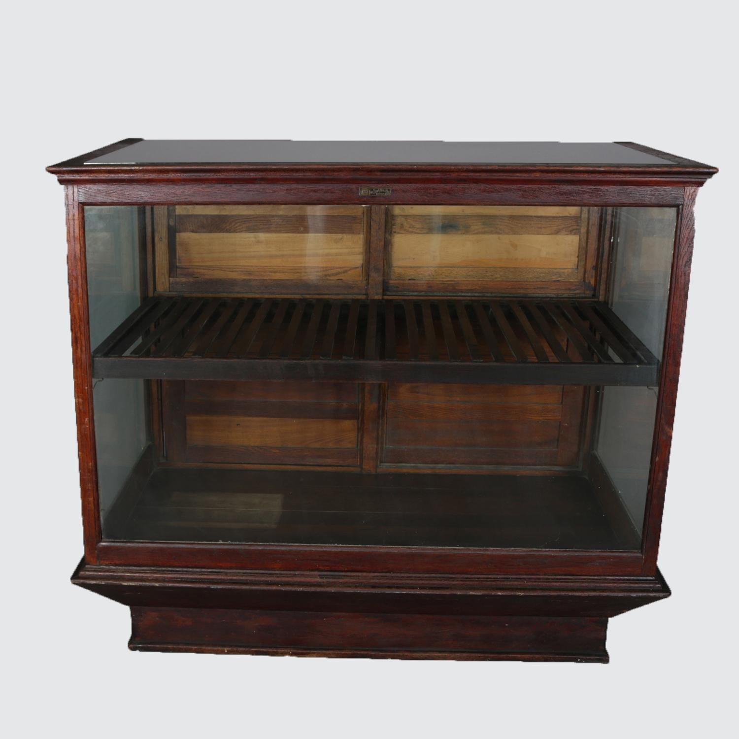 20th Century Antique Oak and Glass Country Store Display Cabinet by Sun Mfg. Co., circa 1900