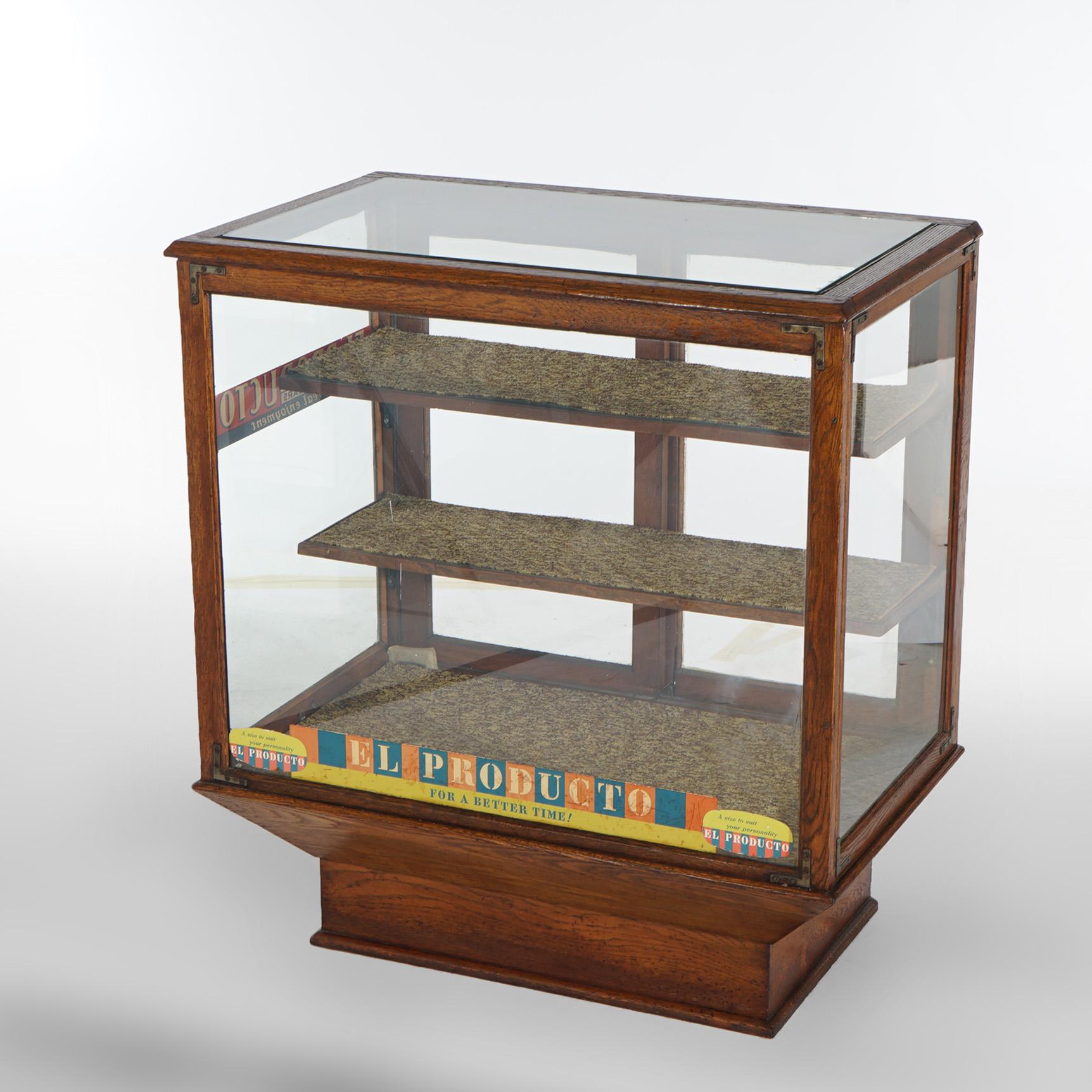 ***Ask About Discounted In-House Shipping***
An antique country store cigar display case offers oak frame with sliding glass doors, raised on tapered base and having 
