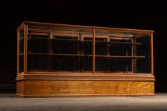Antique Oak & Glass Retail Showcase with Storage Base