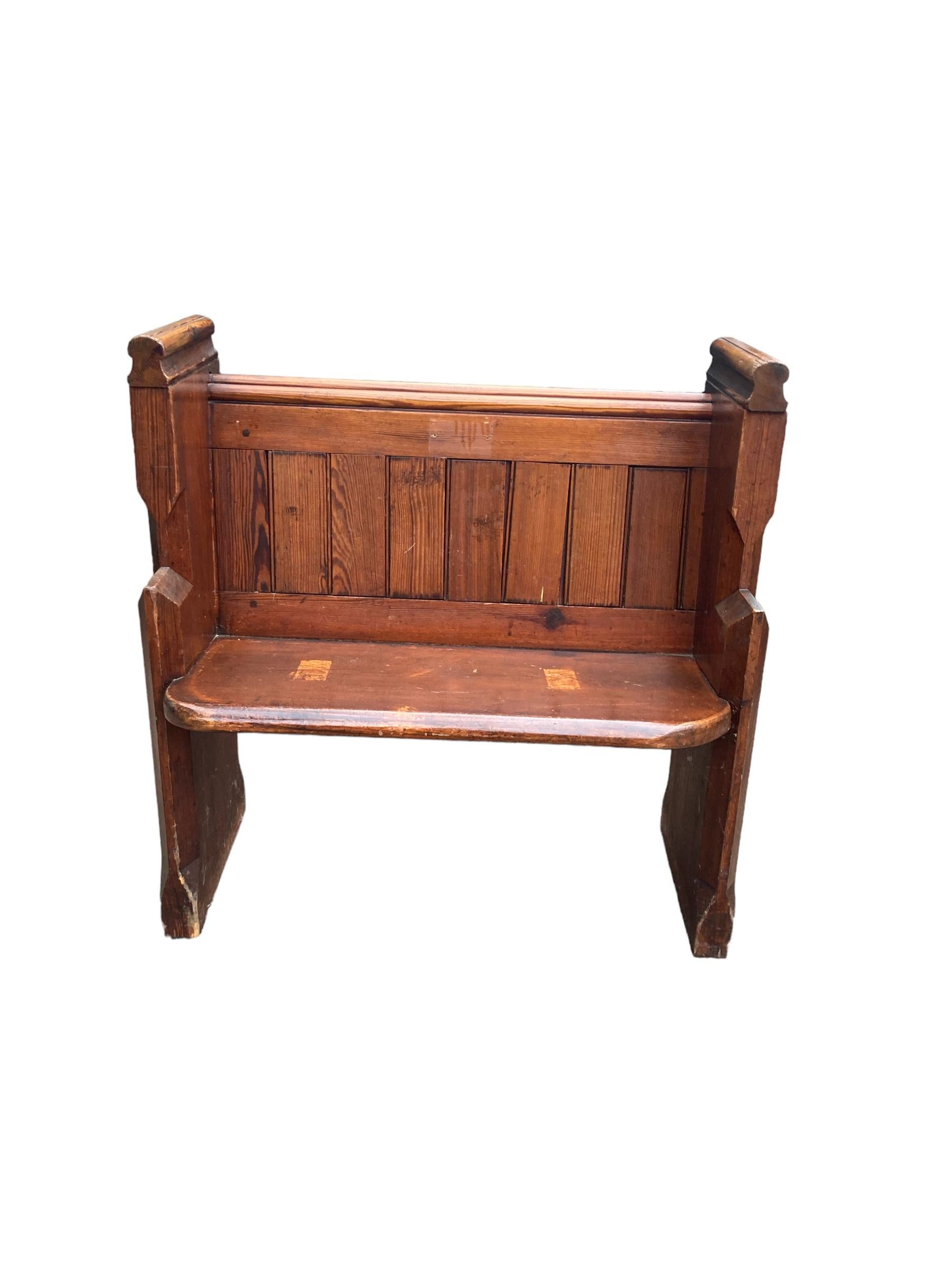 Antique Oak Gothic style Church pew in Original Condition with numbers 44 on side. Shows signs of wear which adds to its character. Made with Heavy Oak, this is perfect for any Hall way or Mud room.

H: 93 cm W: 90 cm D: 50 cm Seat H: 48 cm