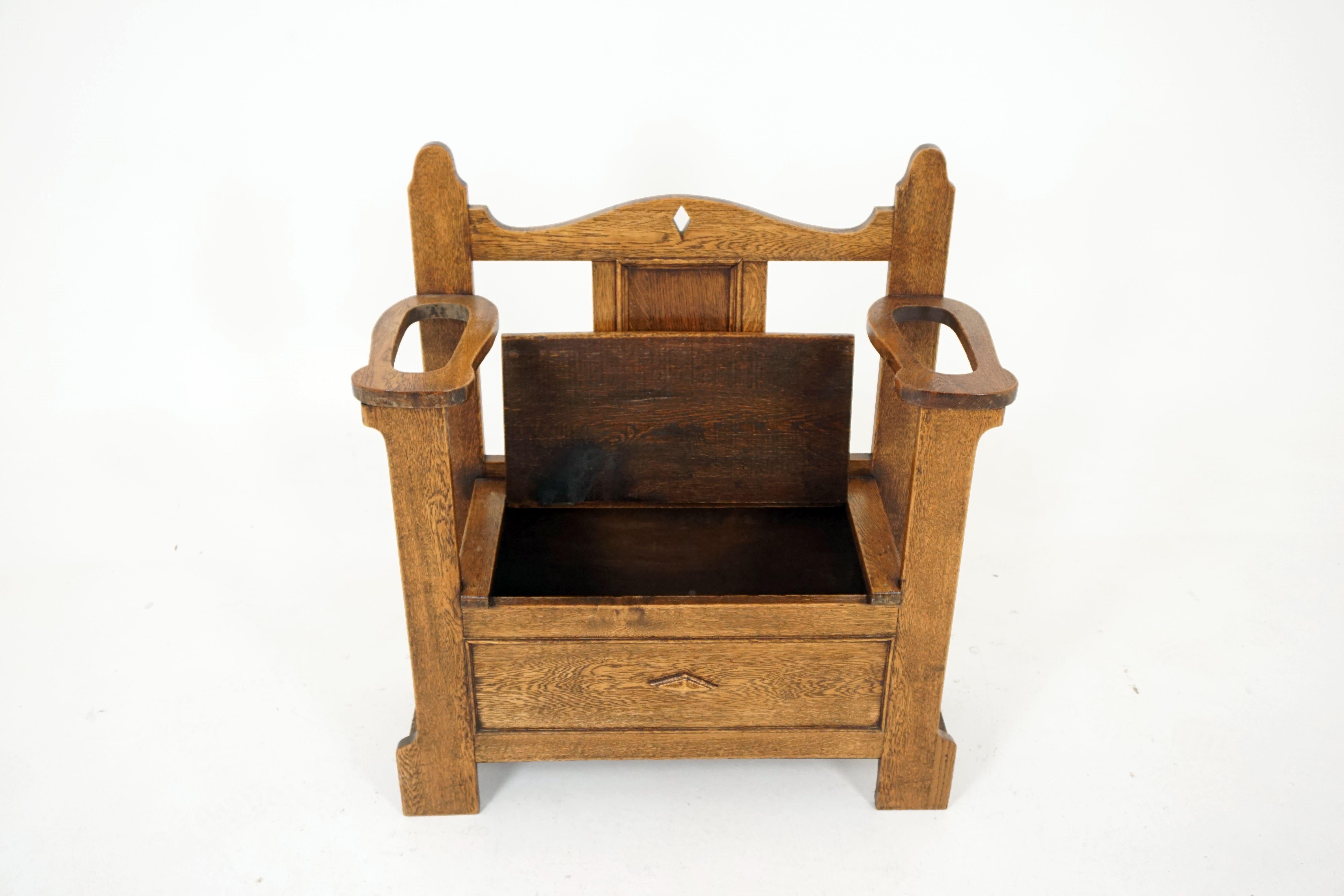 Antique oak hall seat, Arts & Crafts, with umbrella or stick stand, antique furniture, Scotland 1910, B2010

Scotland, 1910
Solid oak
Pierced diamond to the back
Panel below
Plank seat lifts up with storage for shoes, etc.
Pierced arms to the