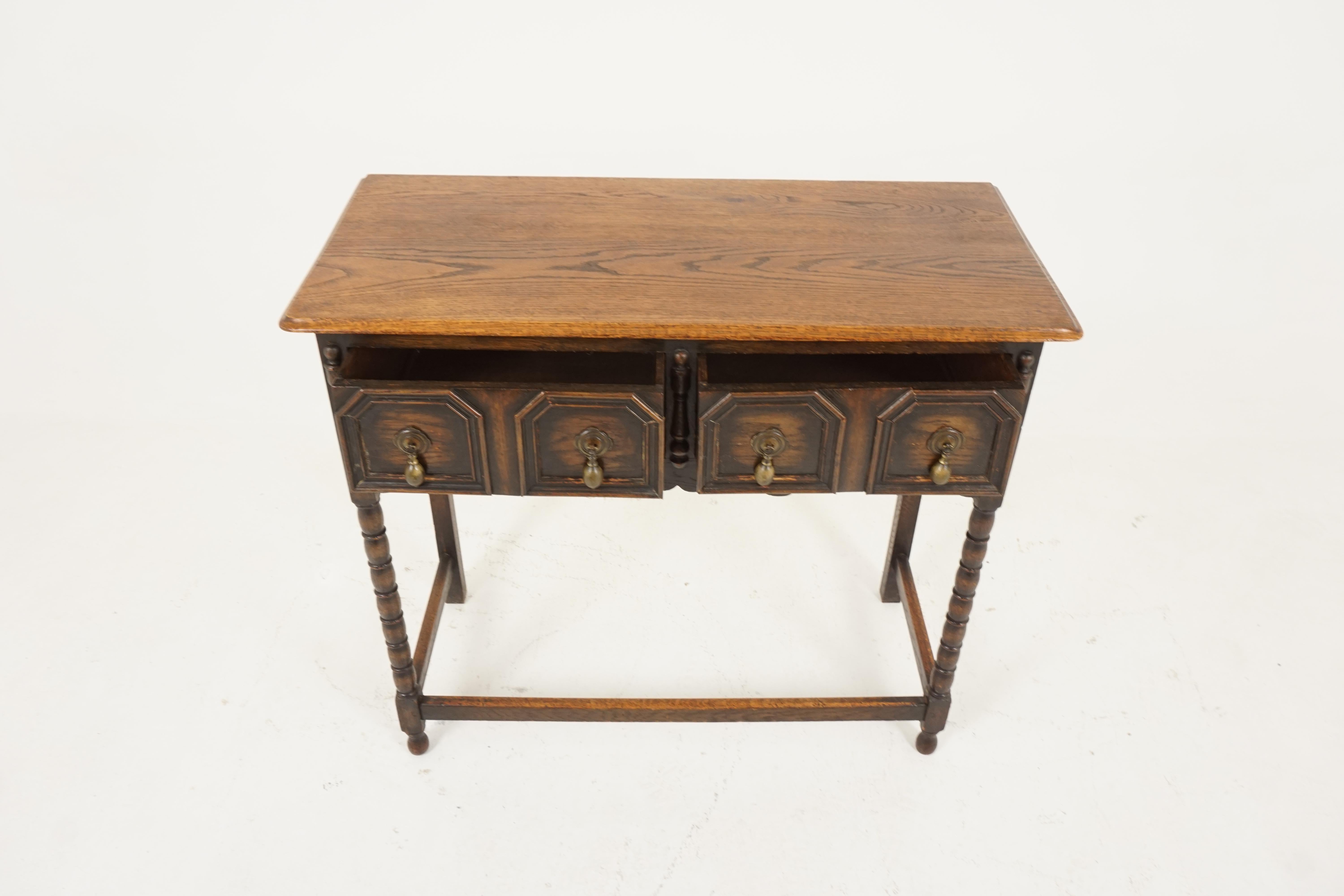 Antique oak hall table, lamp or side table, Scotland, 1920, B2223

Scotland, 1920
Solid oak
Original finish
Rectangular moulded top
Pair of paneled moulded dovetailed drawers
Fitted with original brass handles
Wavy skirt underneath
Standing