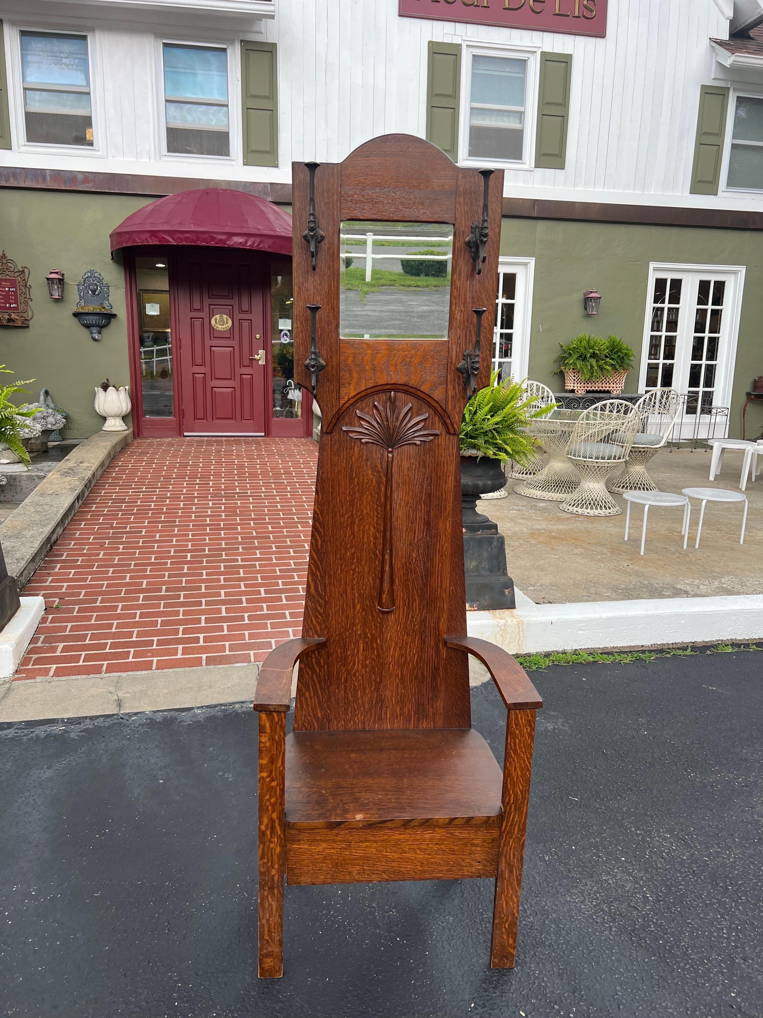 Antique Oak Hall Tree Chair with Mirror. Adorable folk art piece of Americana. Perfect for a small entryway or hallway to hang your hat, coat, purse or dog leash on. Or use to check your make up before you leave the house. Solid oak wood with solid