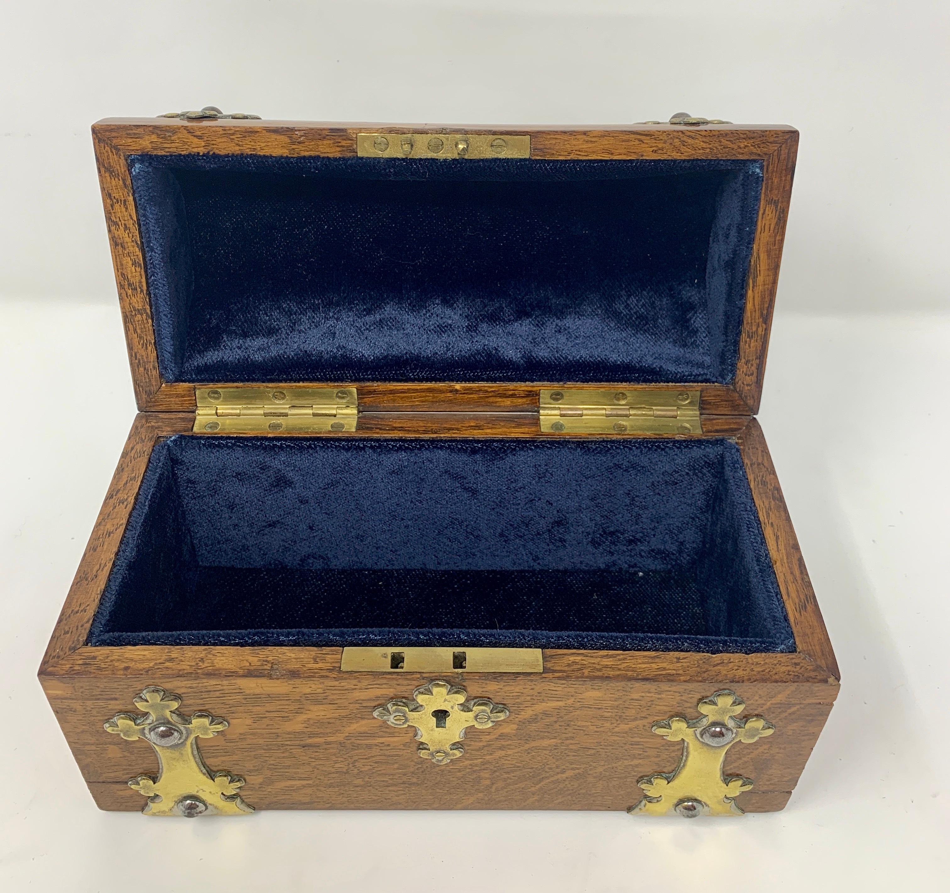 This box with brass mounts could be used as originally intended, for jewelry or watches, or for other valuables. It is quite handsome!.
 