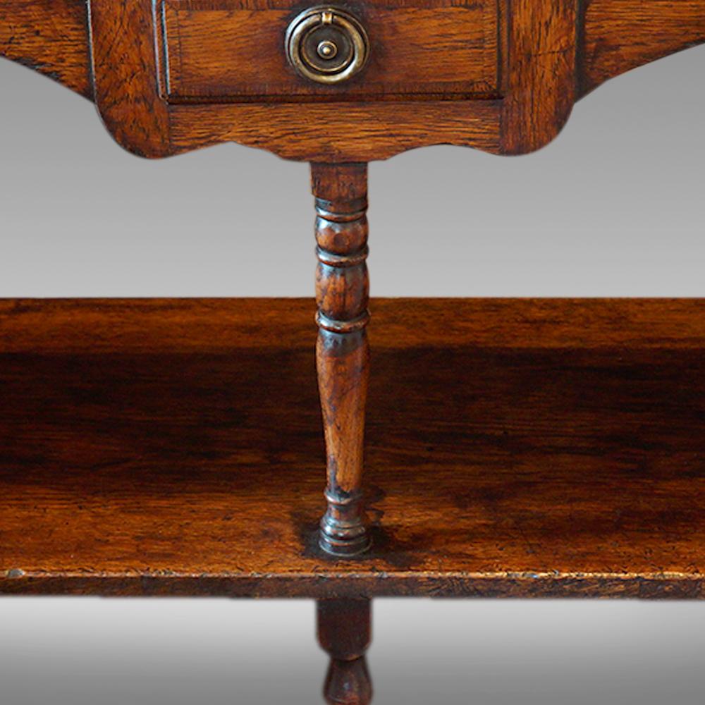 Antique oak dresser base
This antique oak dresser base was made in the late 19th century.
This antique oak pot board dresser that we are offering you are known as pot board dressers as they have the planked surface running under that were to stack