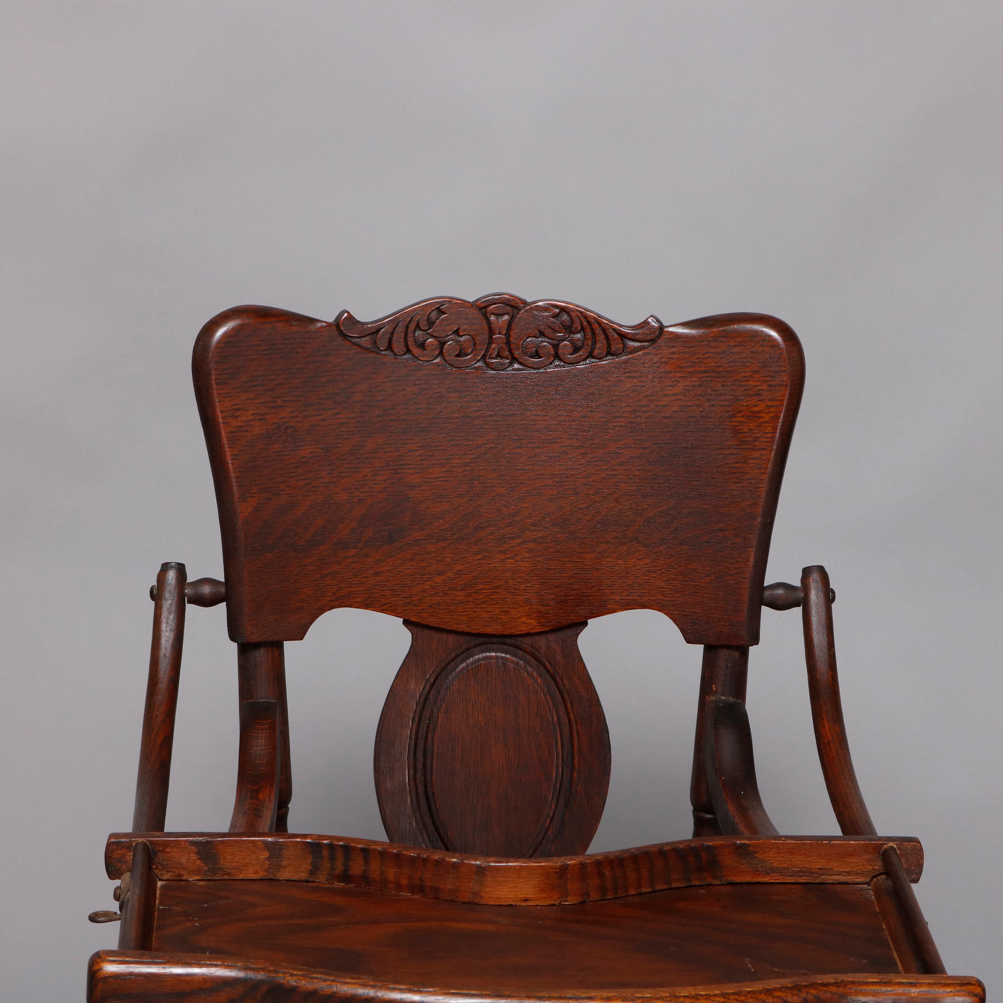 Antique Oak Pressed Carved Adjustable Conversion High Chair Rocker, circa 1910 In Good Condition In Big Flats, NY