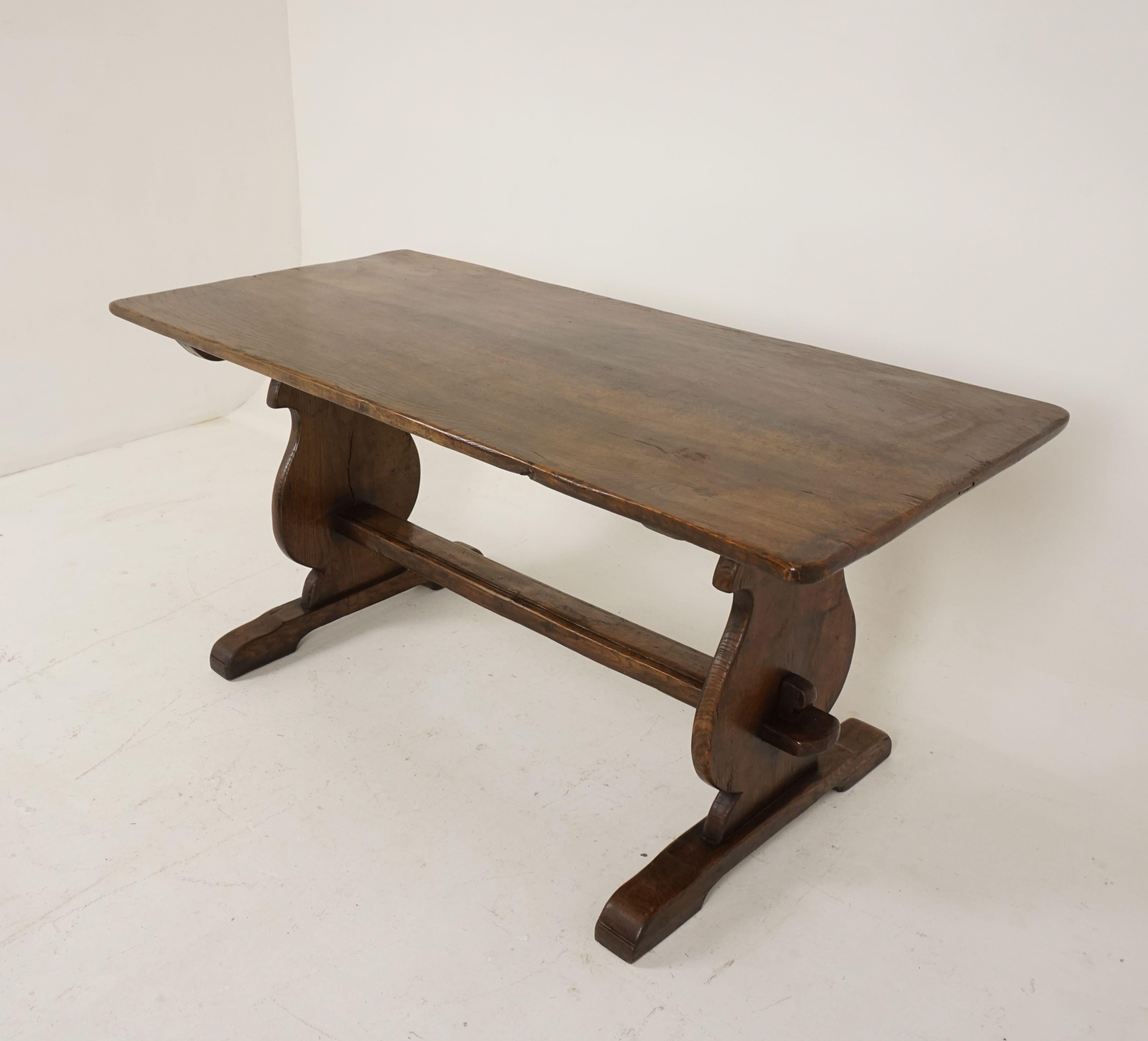 Antique oak refectory farmhouse dining table trestle ends, Scotland 1920, B2420

Scotland 1920
Solid oak
Original finish
Solid plank oak top
Standing on shaped trestle ends
With a very thick stretcher to the base
Nice warm patina
The table