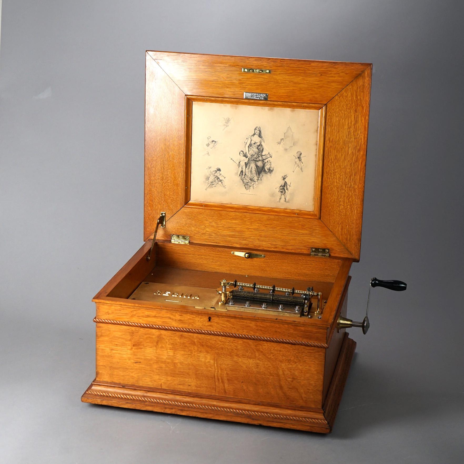 An antique music box by Regina offers quarter sawn oak case having carved rope twist trim, maker label as photographed; working condition; 19th century

Measures - 12.5