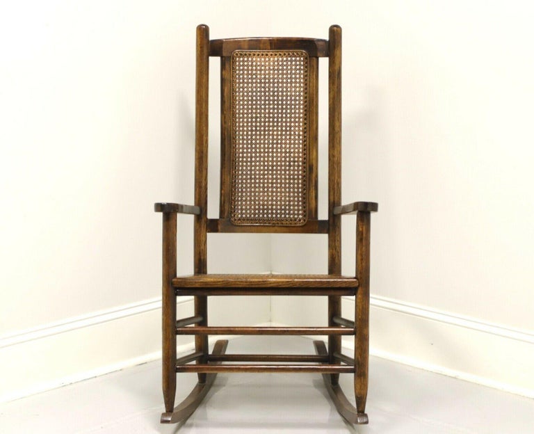 Antique Oak Rocking Chair with Caned Seat and Backrest at 1stDibs cracker barrel rocking