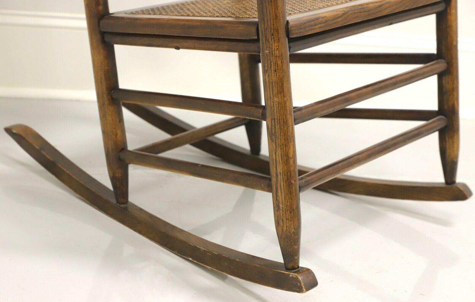 American Antique Oak Rocking Chair with Caned Seat and Backrest